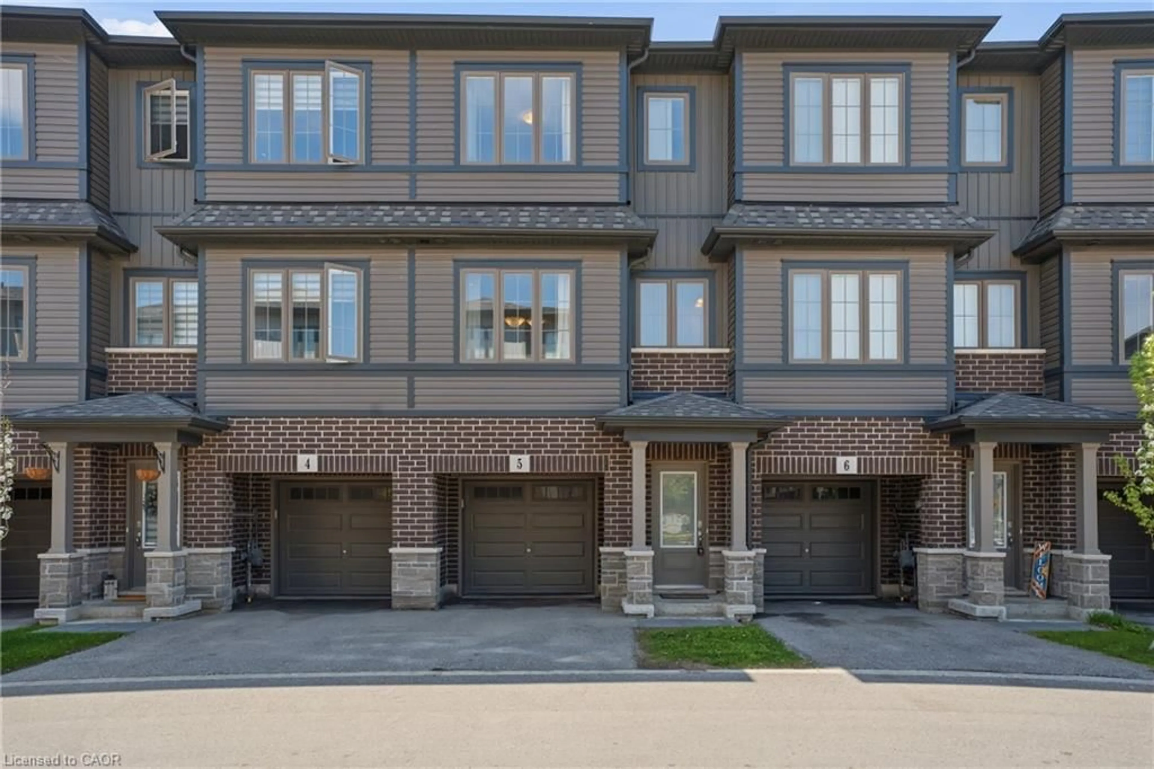Home with brick exterior material, street for 124 Compass Trail #5, Cambridge Ontario N3E 0E3