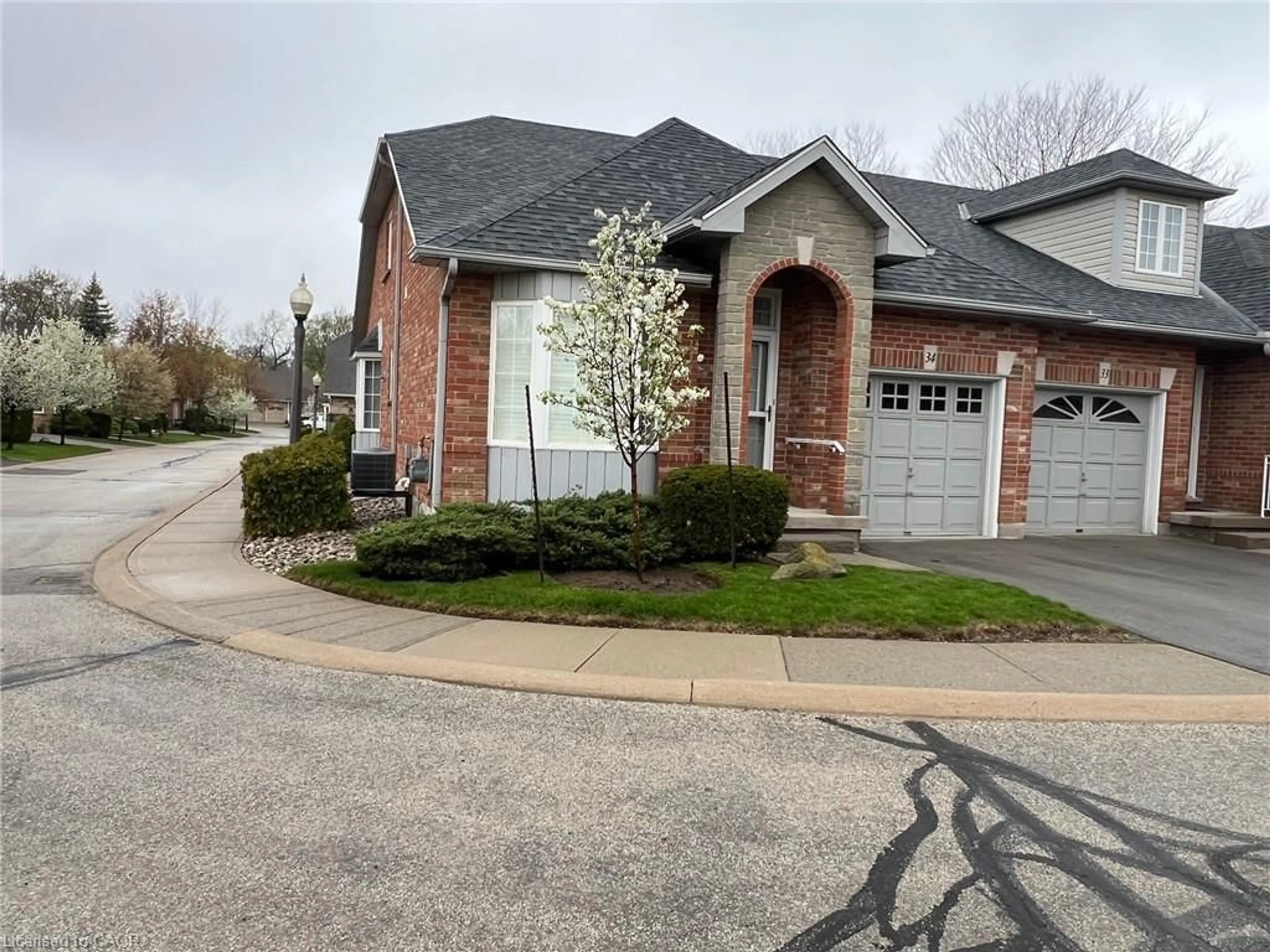 Home with brick exterior material, street for 47 Main St #34, Waterdown Ontario L0R 2H0