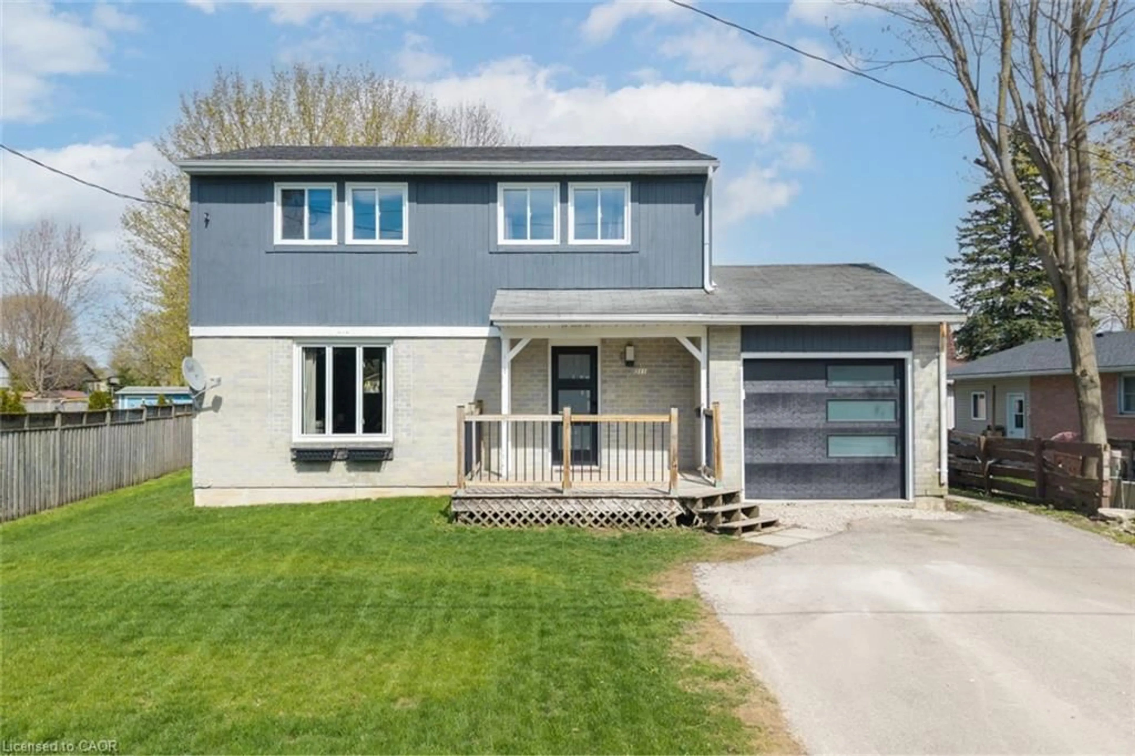 Home with vinyl exterior material, street for 311 Eliza St, Arthur Ontario N0G 1A0