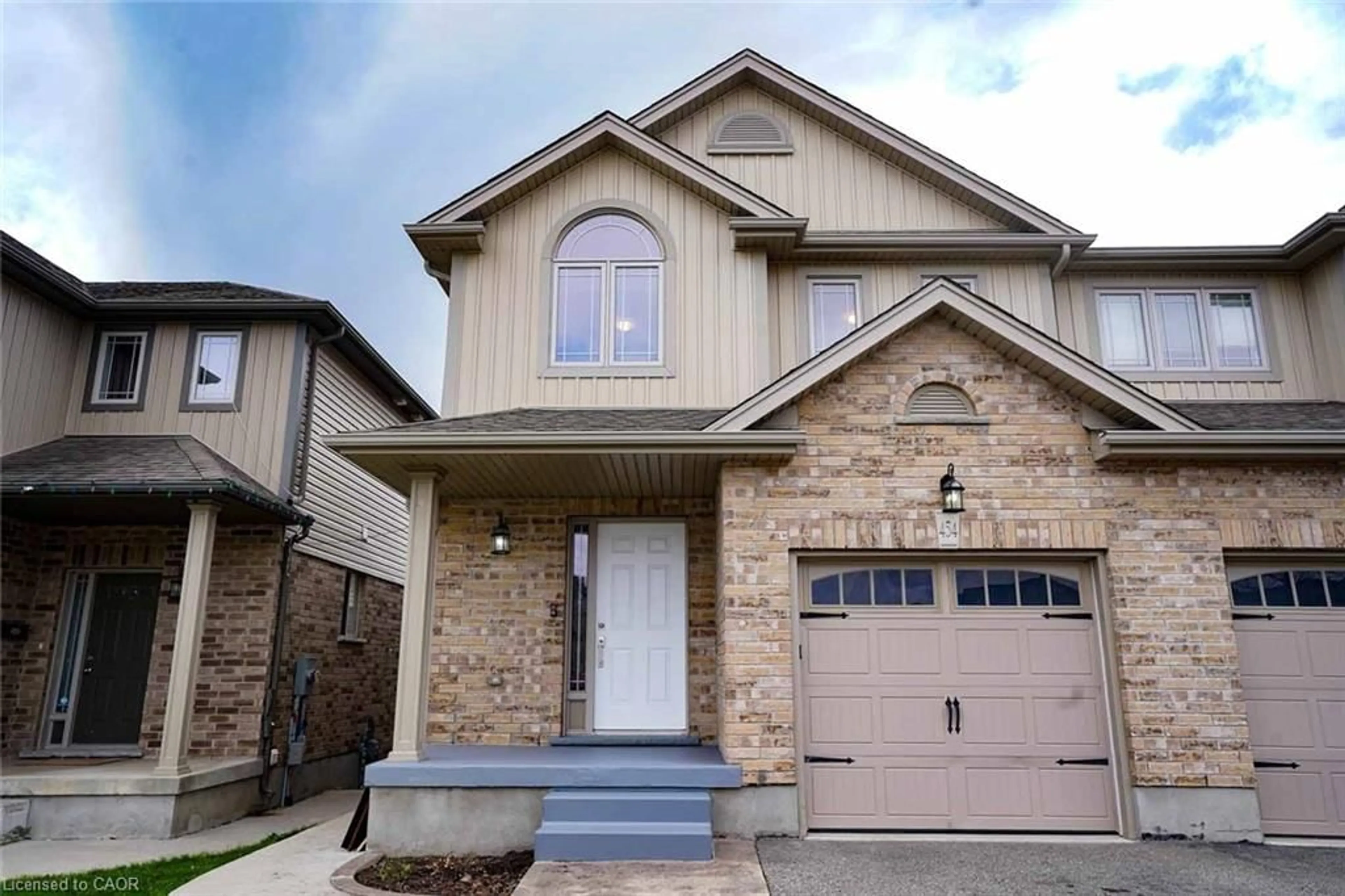 Home with brick exterior material, street for 454 Starwood Dr, Guelph Ontario N1E 0L6