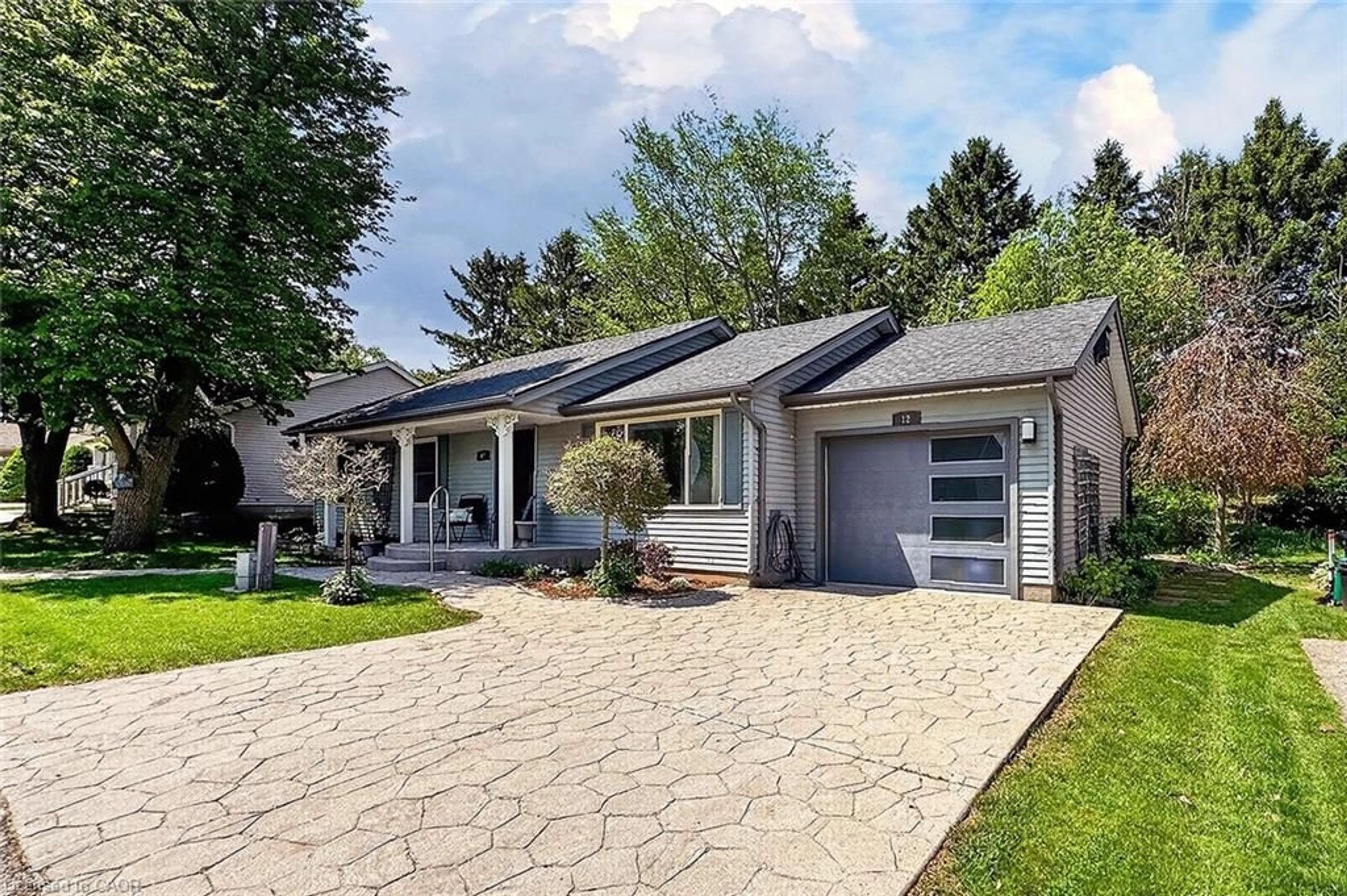 Home with brick exterior material, street for 12 Fieldstone Walk, New Hamburg Ontario N3A 2E9