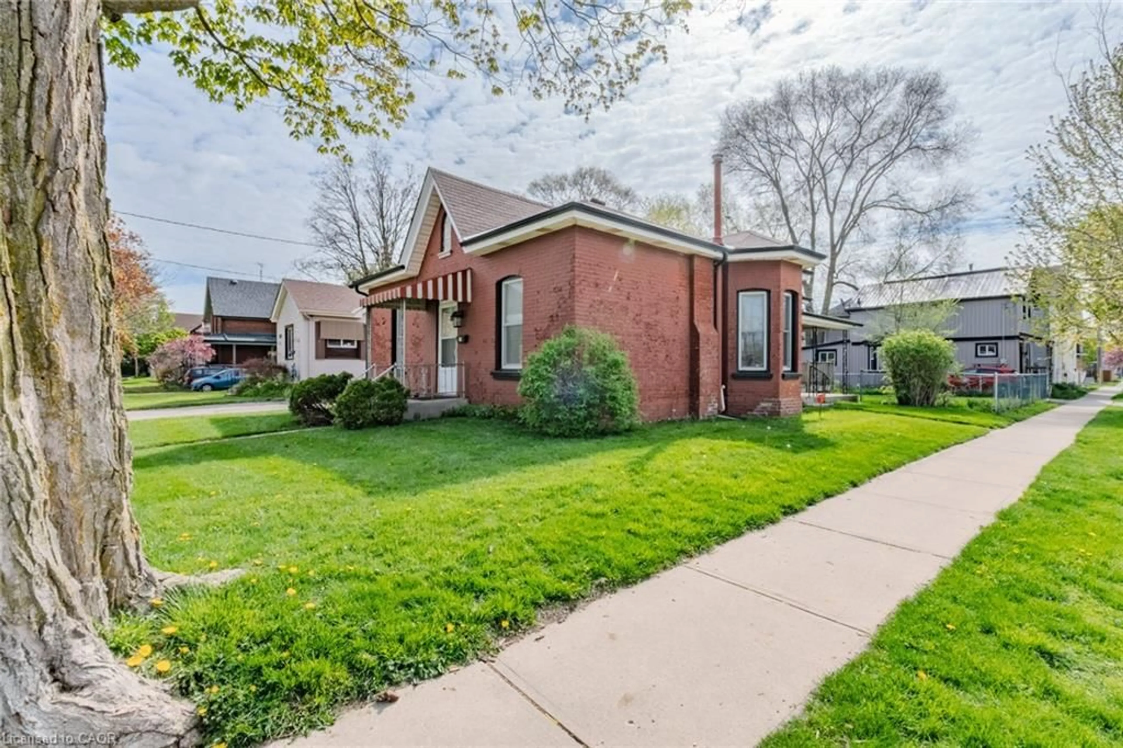 Home with brick exterior material, street for 68 Sherwood Dr, Brantford Ontario N3T 1N5