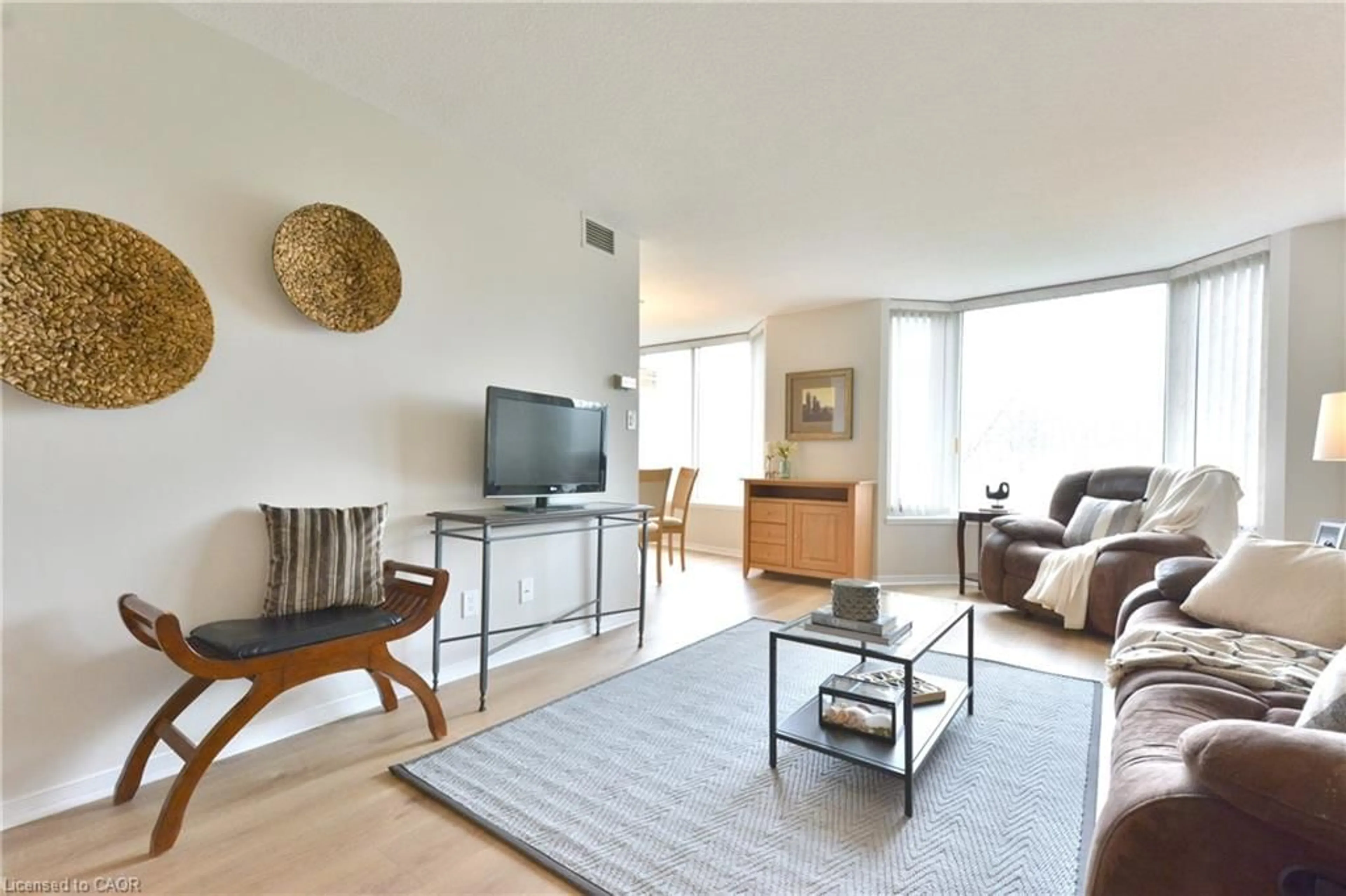 Living room with furniture, unknown for 180 Limeridge Rd #307, Hamilton Ontario L9C 7C7