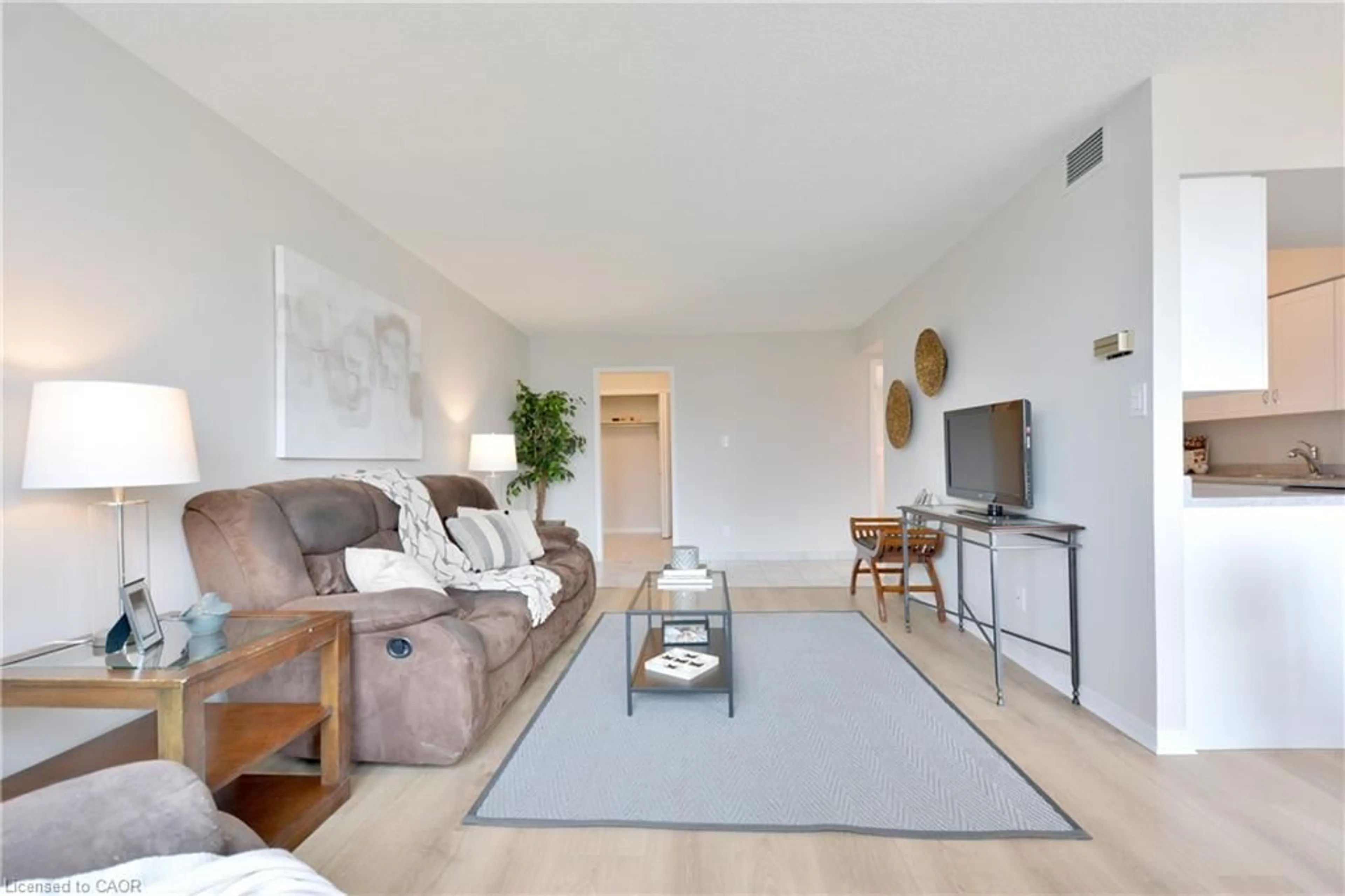 Living room with furniture, unknown for 180 Limeridge Rd #307, Hamilton Ontario L9C 7C7