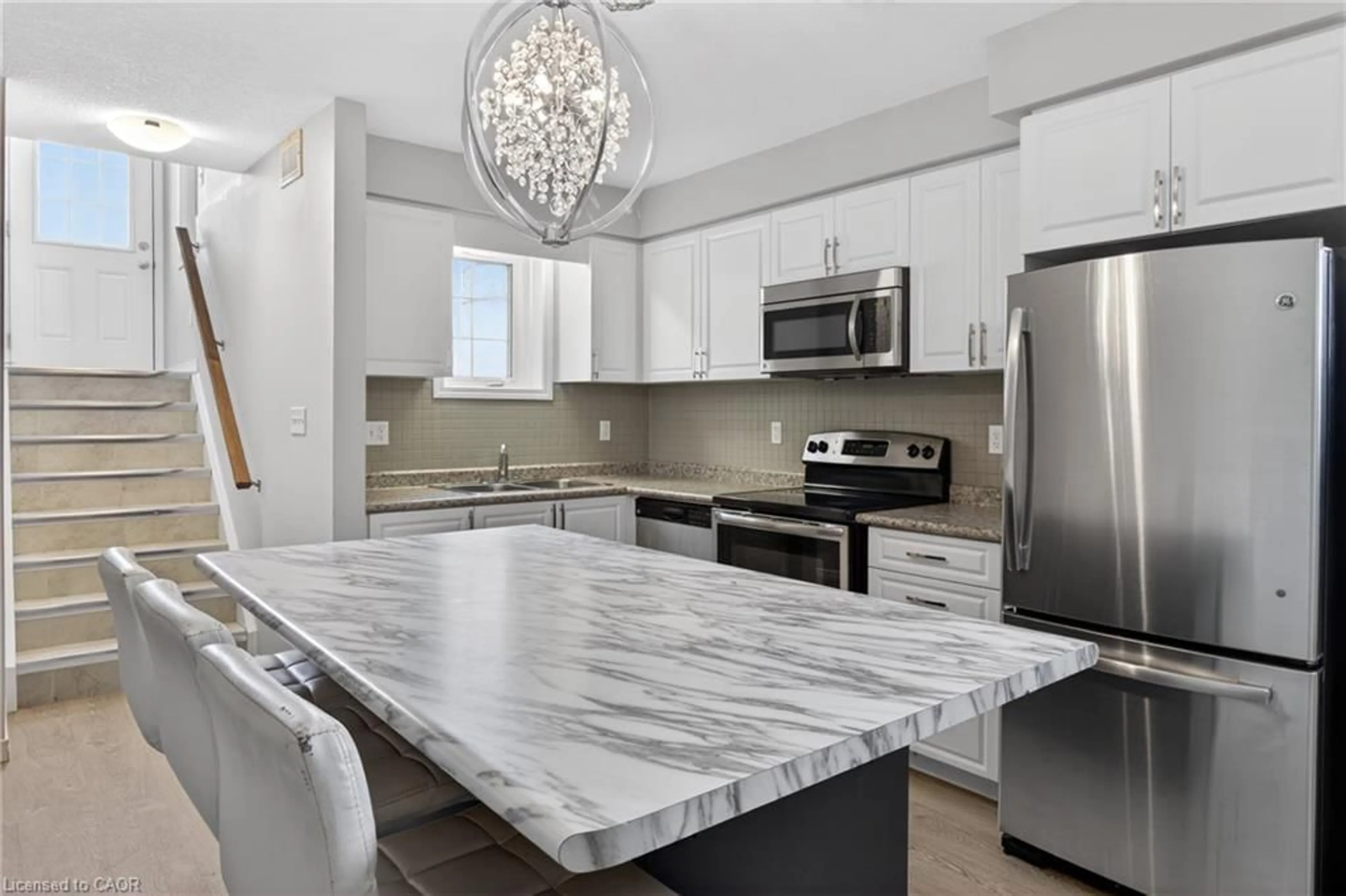 Open concept kitchen, ceramic/tile floor for 235 Jessica Cres #A, Kitchener Ontario N2R 0C5