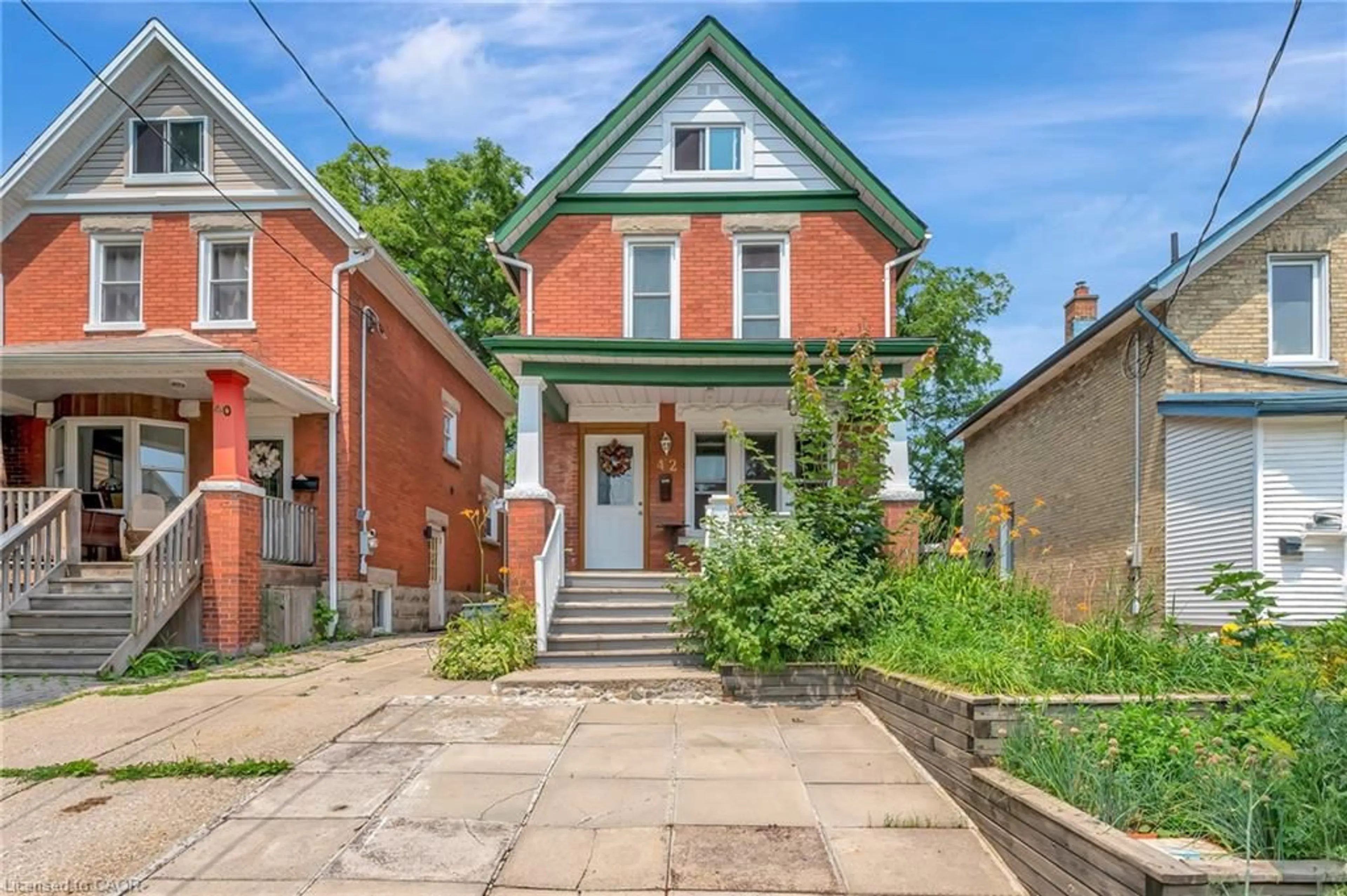 Home with brick exterior material, street for 42 Shanley St, Kitchener Ontario N2H 5N0