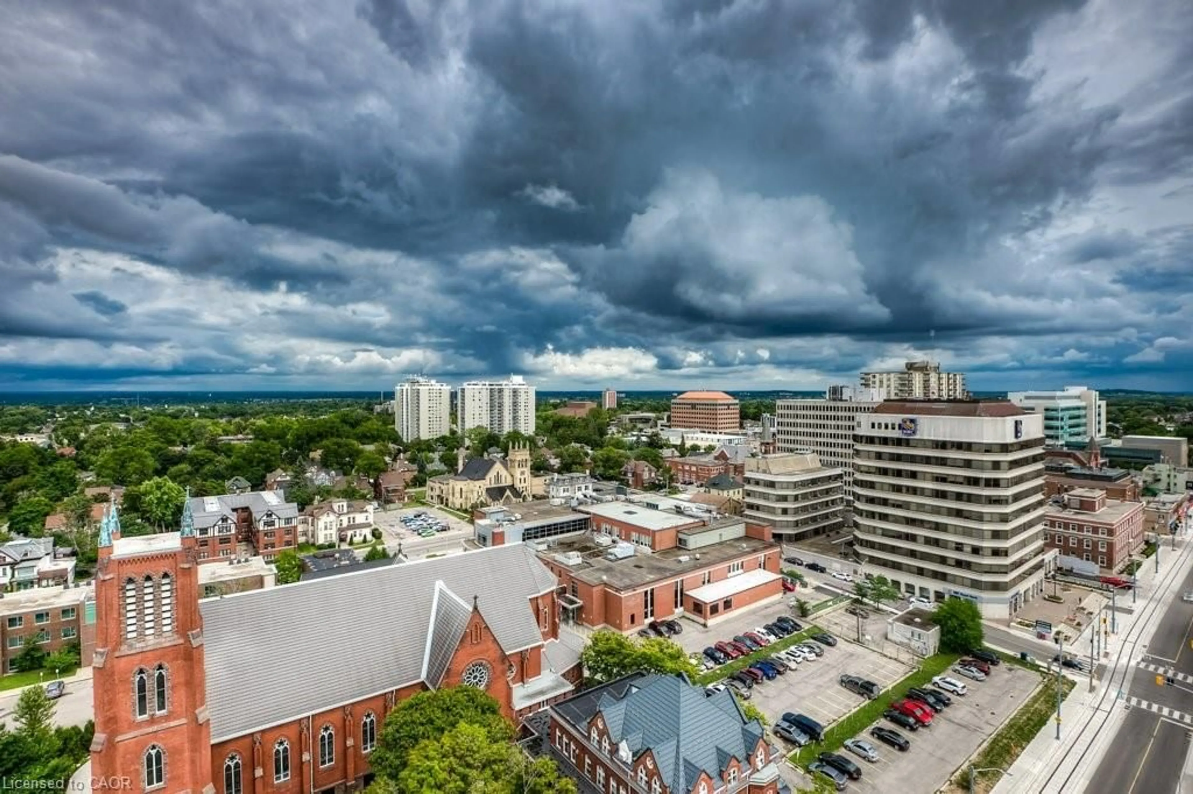 A pic from outside/outdoor area/front of a property/back of a property/a pic from drone, city buildings view from balcony for 85 Duke St #1402, Kitchener Ontario N2H 0B7