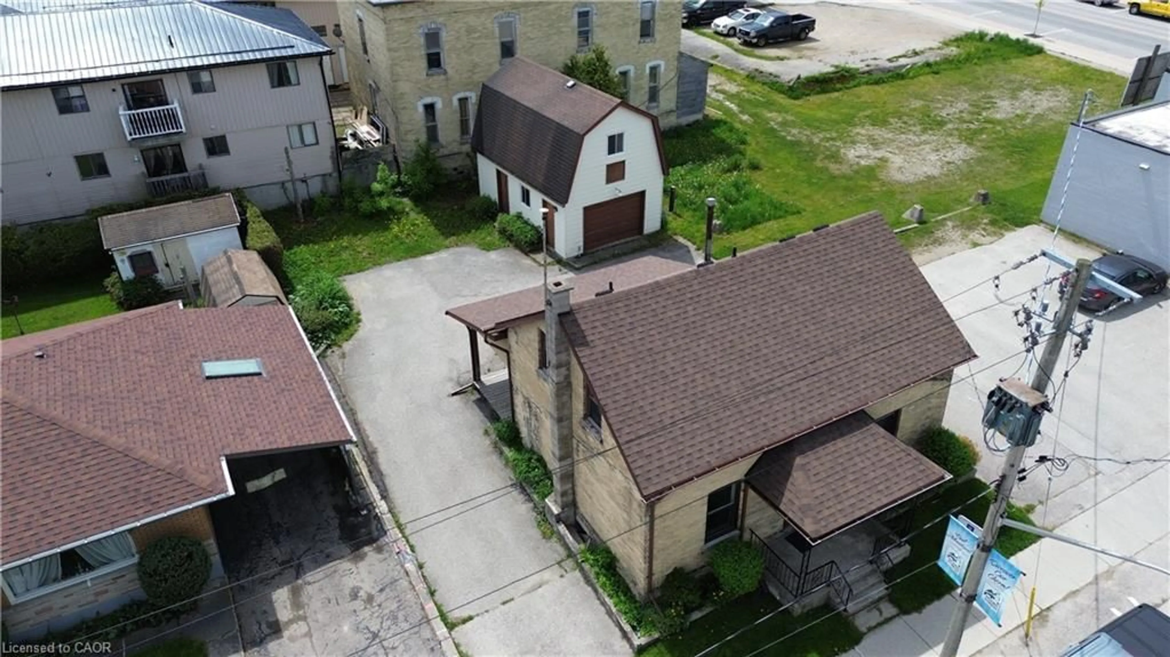 A pic from outside/outdoor area/front of a property/back of a property/a pic from drone, street for 120 King St, Mount Forest Ontario N0G 2L2