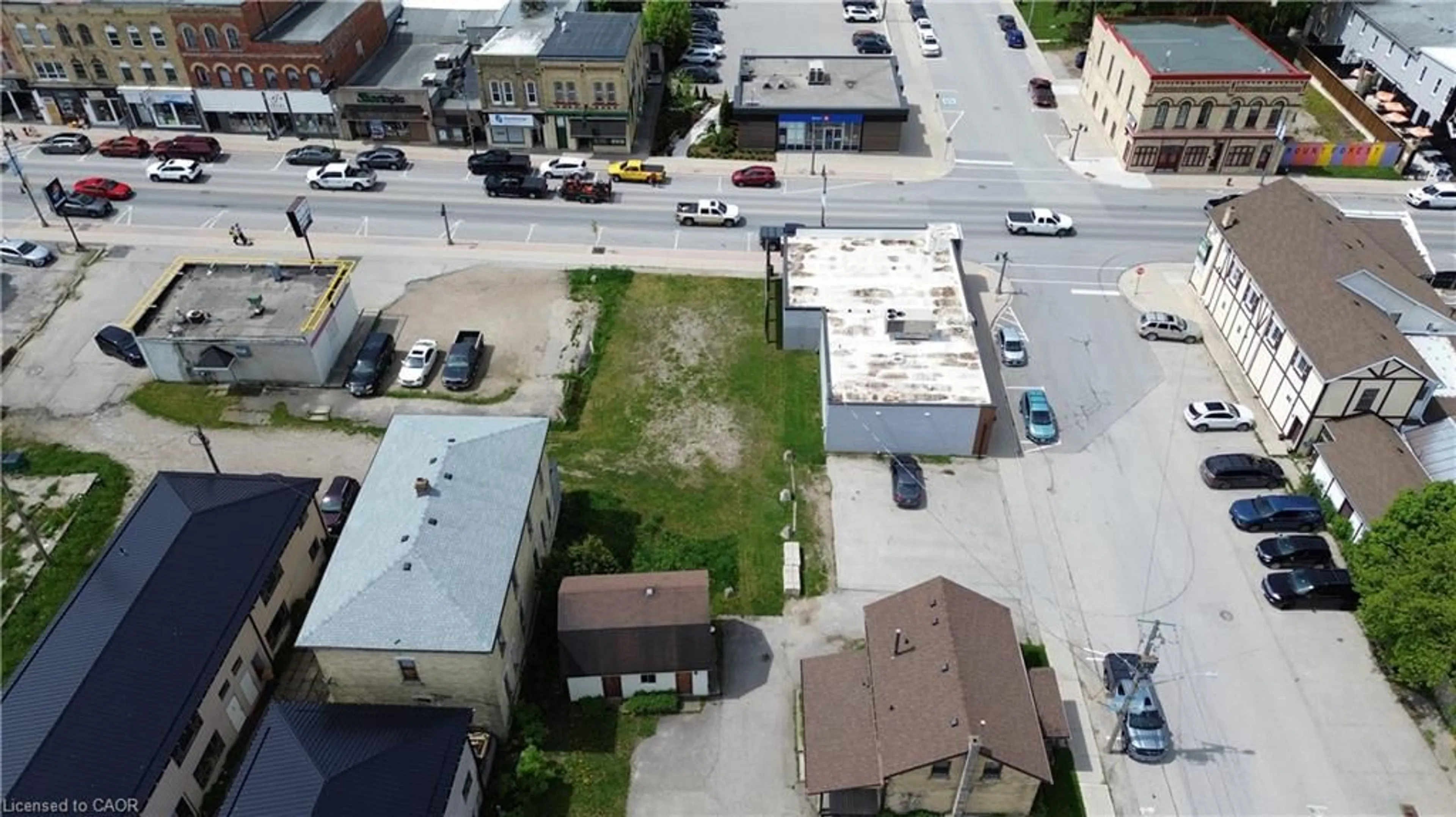 A pic from outside/outdoor area/front of a property/back of a property/a pic from drone, street for 120 King St, Mount Forest Ontario N0G 2L2