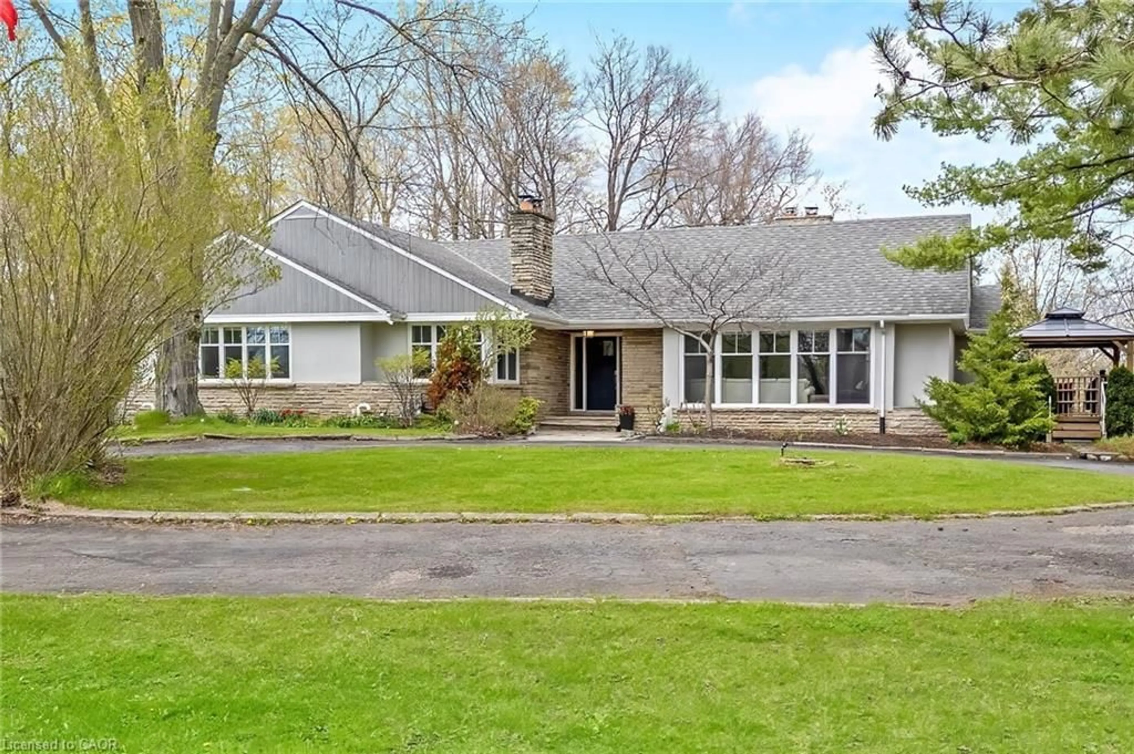 Home with vinyl exterior material, street for 161 Confederation St, Glen Williams Ontario L7G 4S8