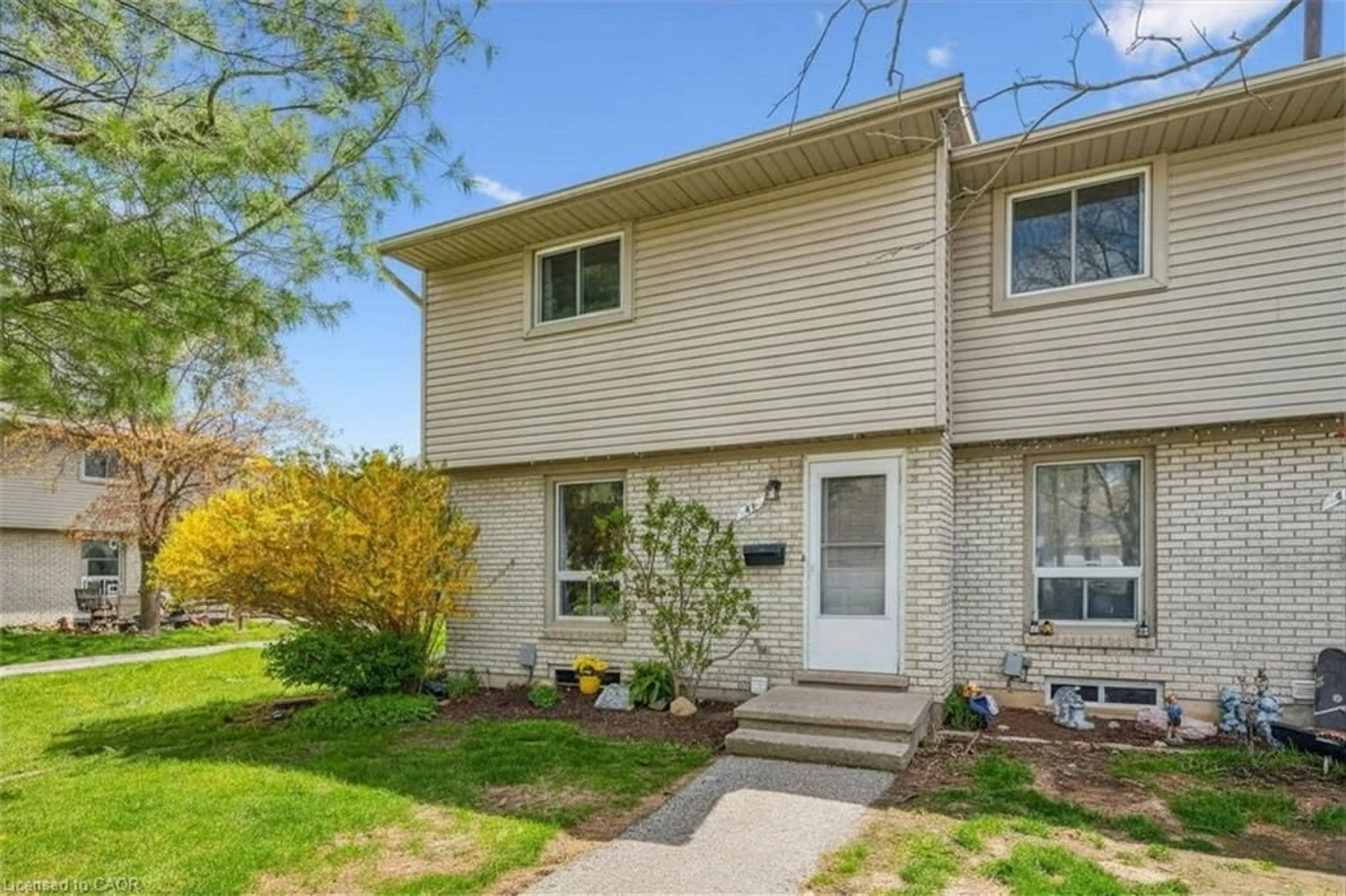 Home with vinyl exterior material, street for 700 Paisley Rd #42, Guelph Ontario N1K 1A3