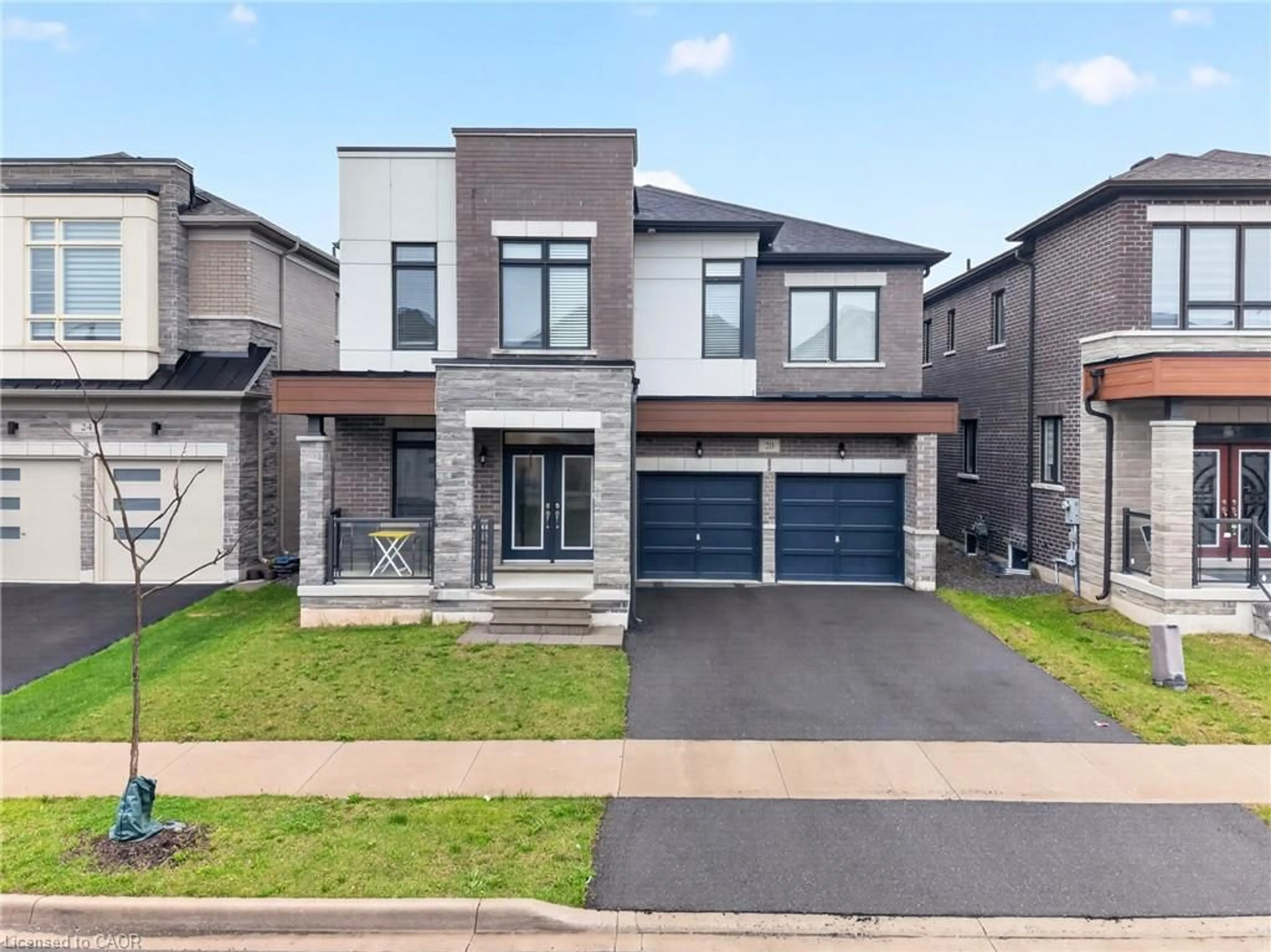 Home with brick exterior material, street for 20 Zimmerman Garden, Waterdown Ontario L8B 1Y9