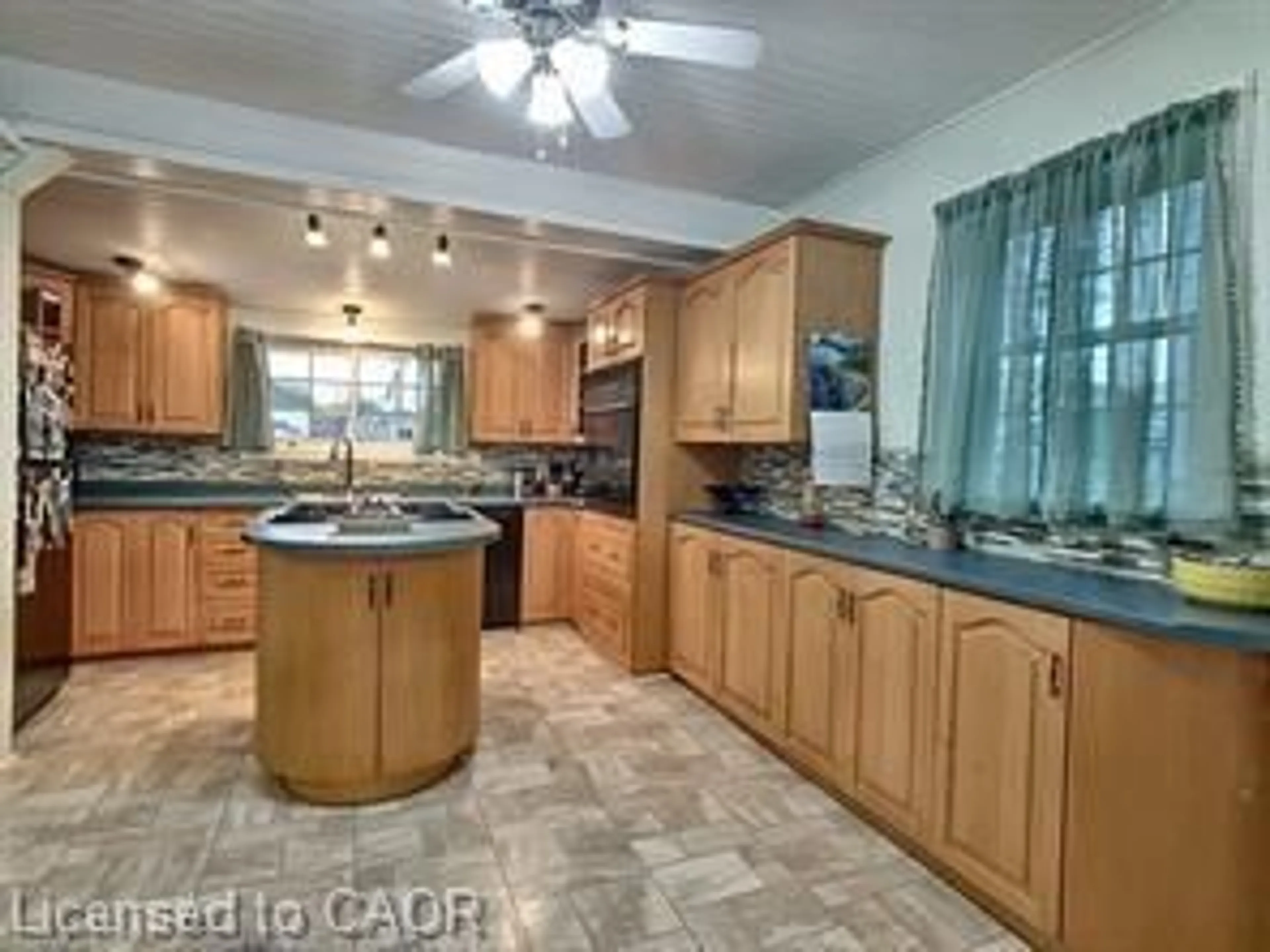Open concept kitchen, ceramic/tile floor for 94 Alma St, Port Colborne Ontario L3K 1G3