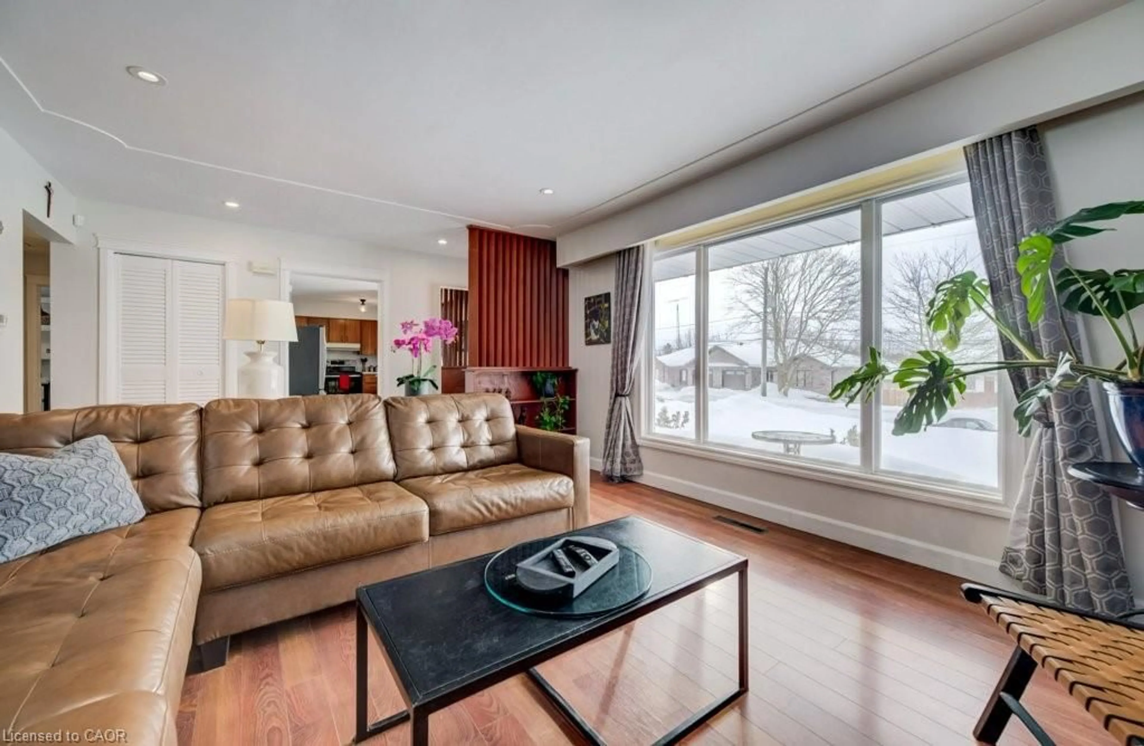 Living room with furniture, wood/laminate floor for 185 Miller St, Mount Forest Ontario N0G 2L3