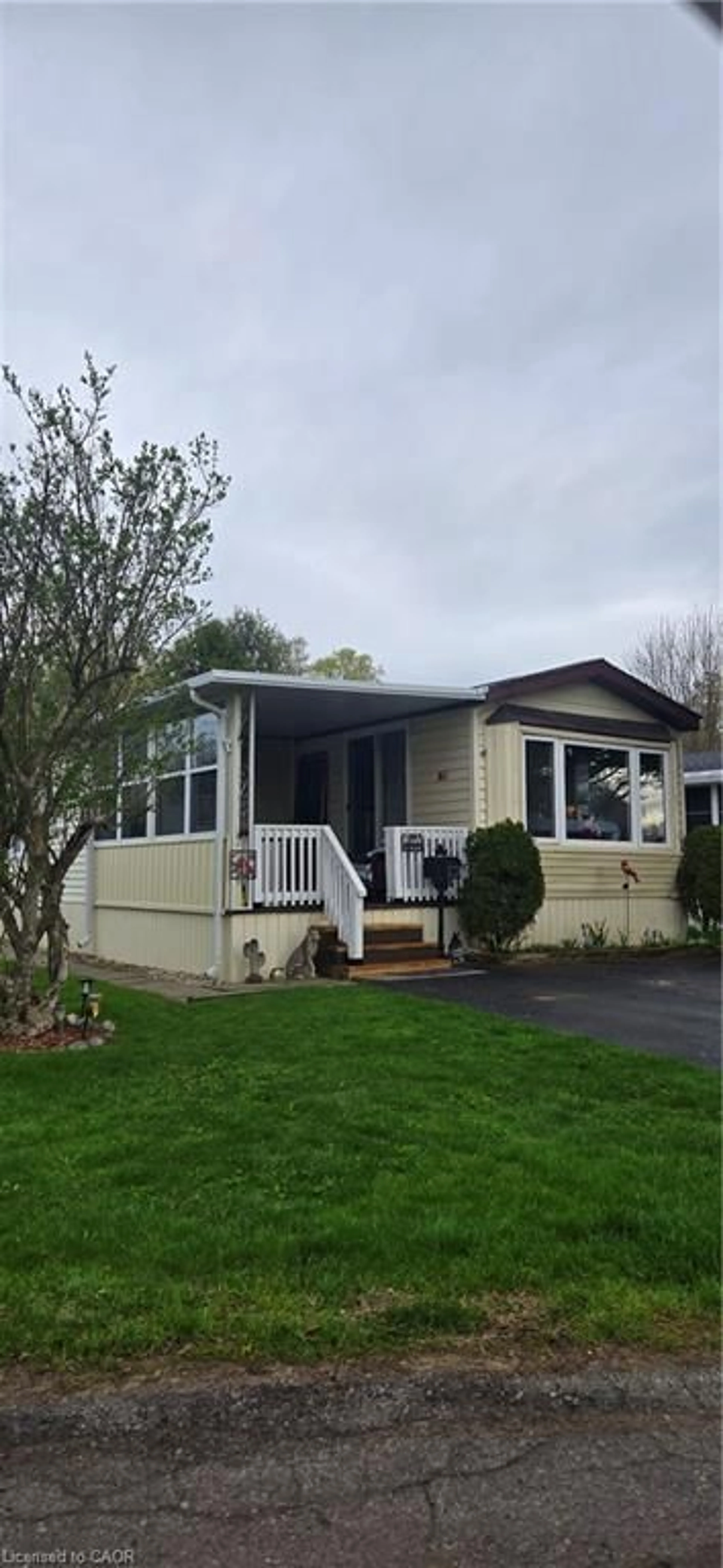 Home with vinyl exterior material, street for 2490 Governors Rd #5 Pondview, Ancaster Ontario