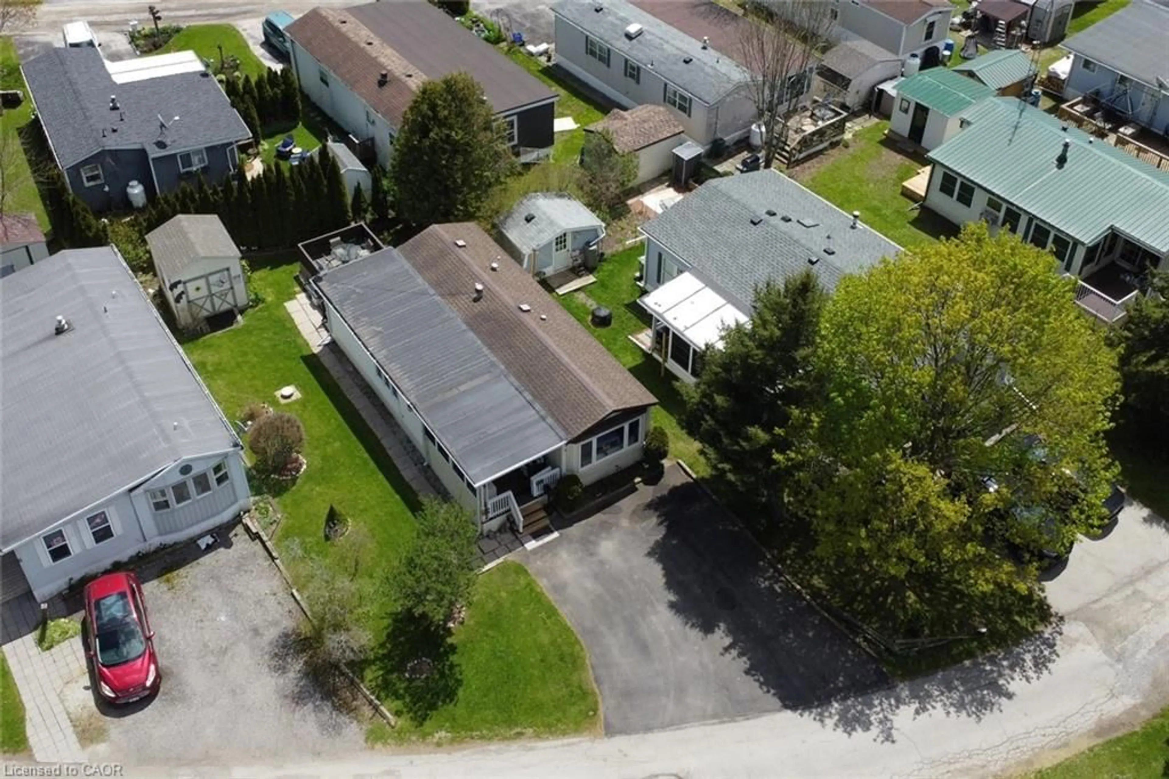 A pic from outside/outdoor area/front of a property/back of a property/a pic from drone, street for 2490 Governors Rd #5 Pondview, Ancaster Ontario