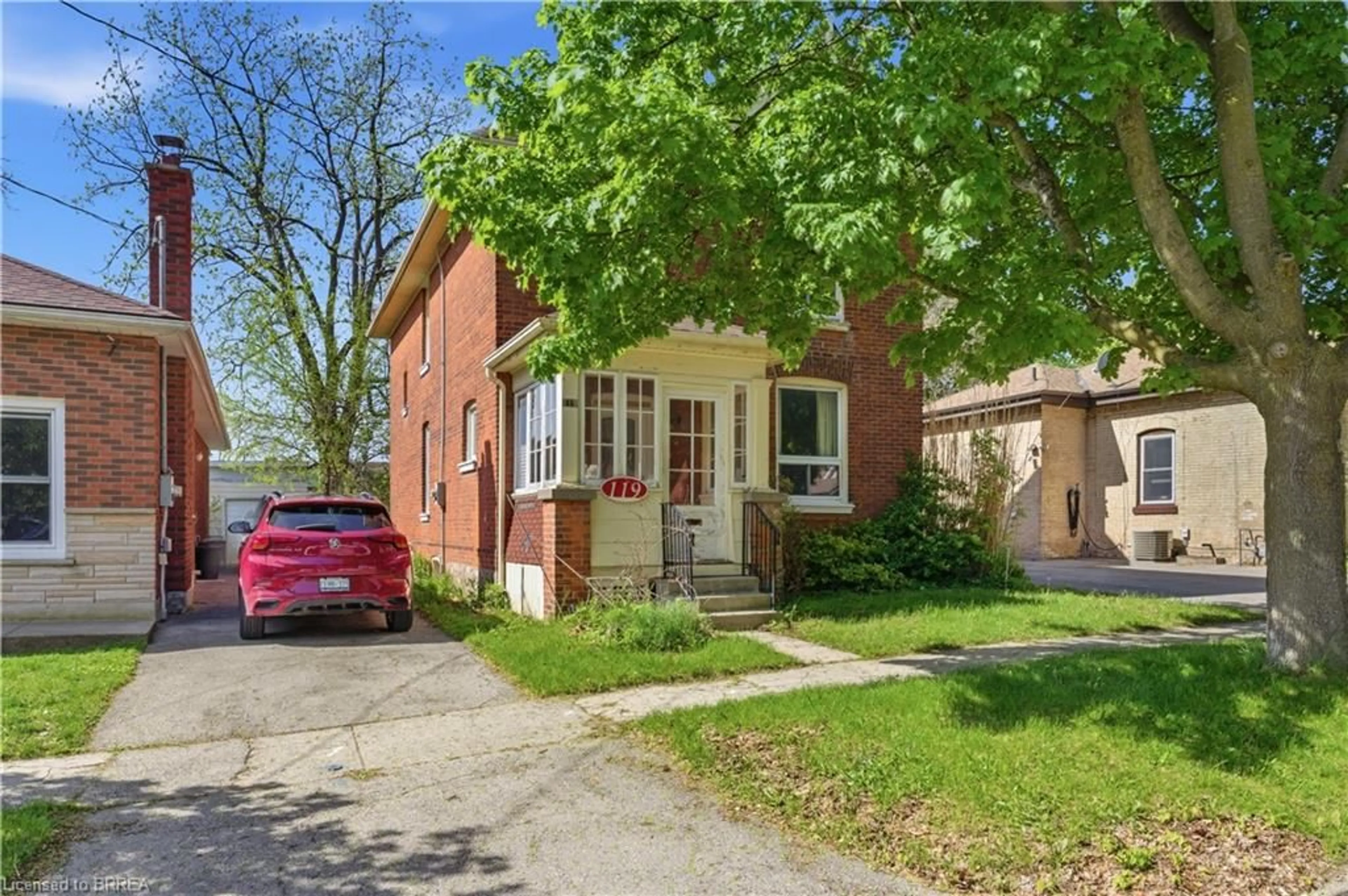 Home with brick exterior material, street for 119 East Ave, Brantford Ontario N3S 3M1