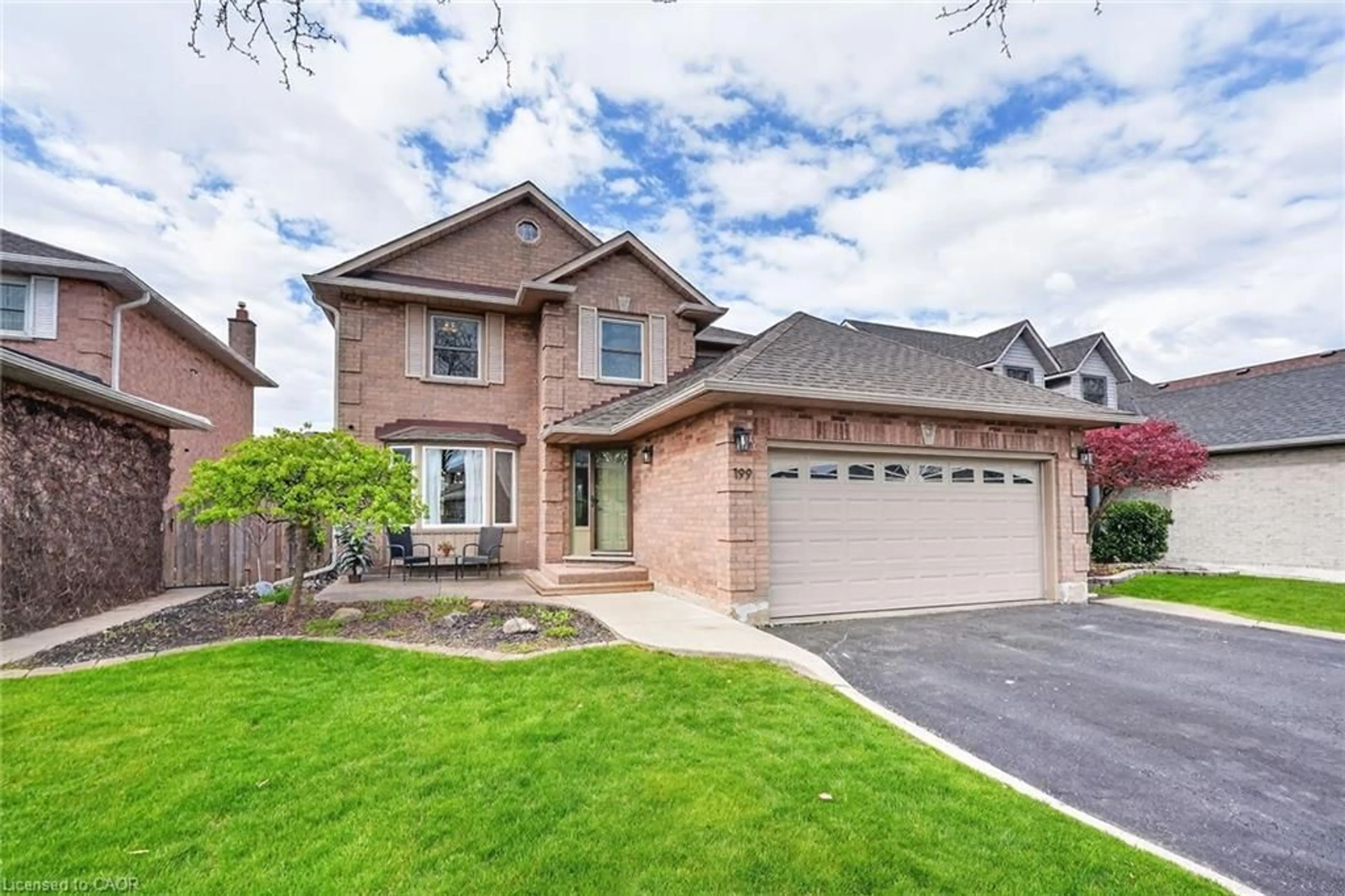 Home with brick exterior material, street for 199 Rowntree Dr, Hamilton Ontario L8W 2N6