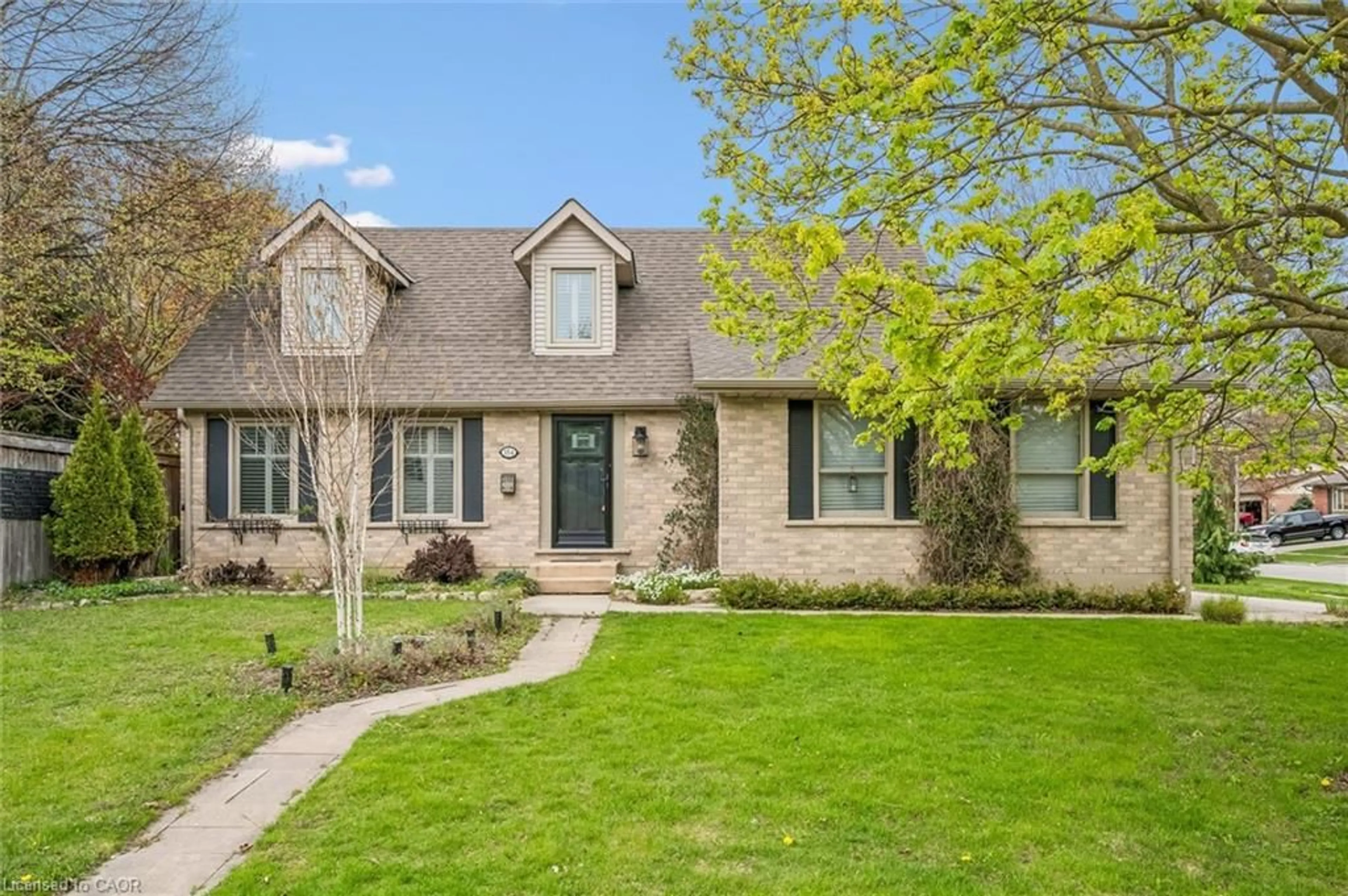 Home with brick exterior material, street for 184 Harvard Rd, Guelph Ontario N1G 4K5
