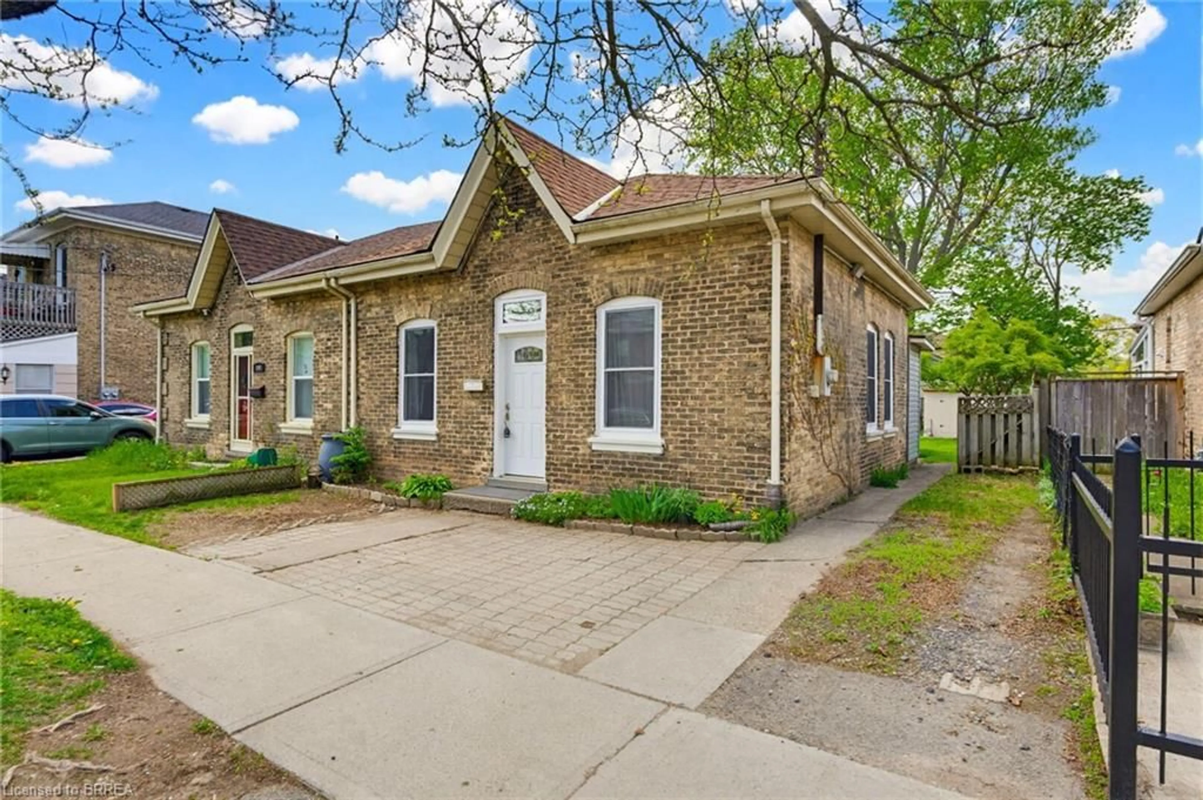 Home with brick exterior material, street for 146 William St, Brantford Ontario N3T 3L3