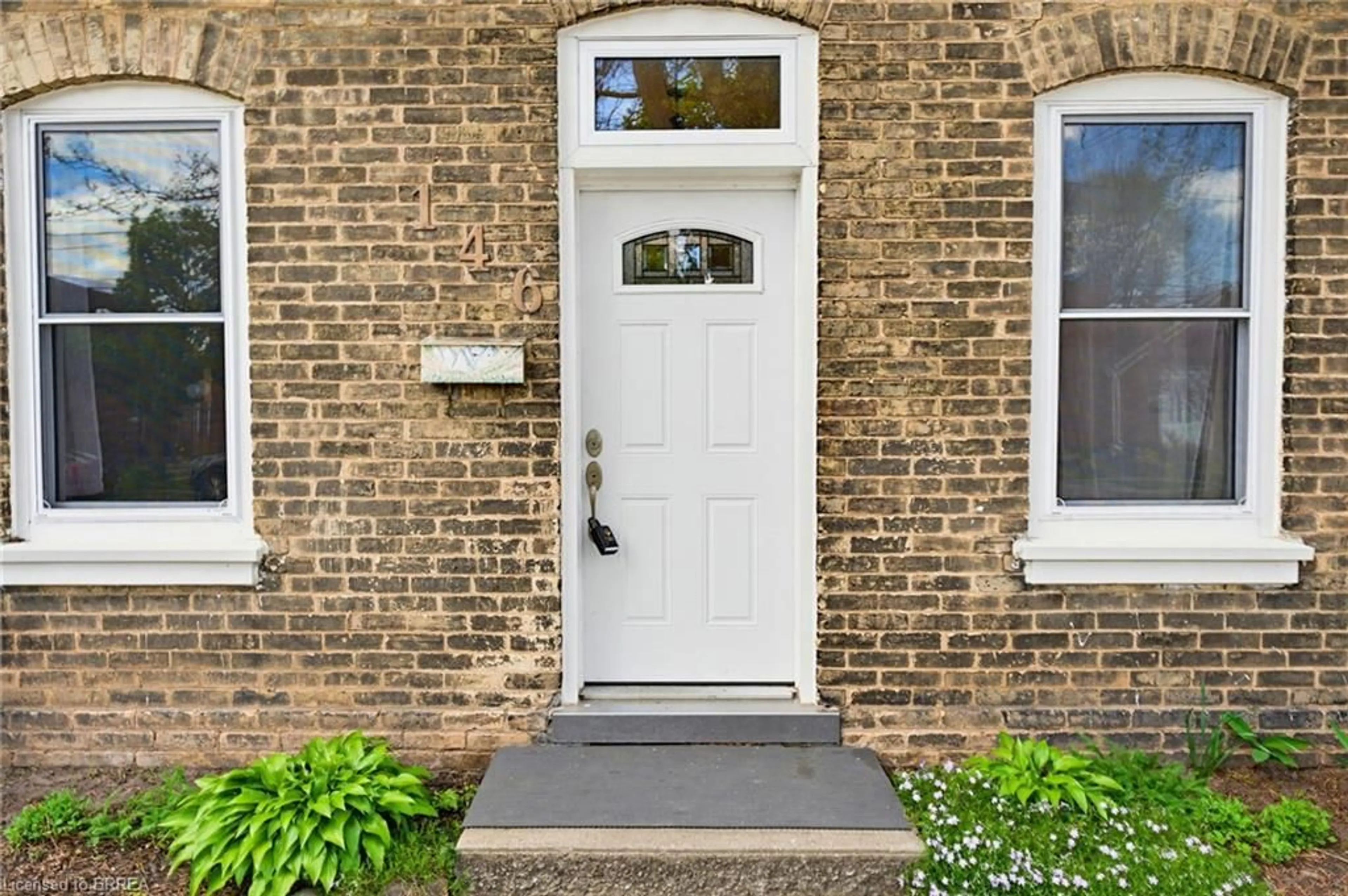 Home with brick exterior material, street for 146 William St, Brantford Ontario N3T 3L3