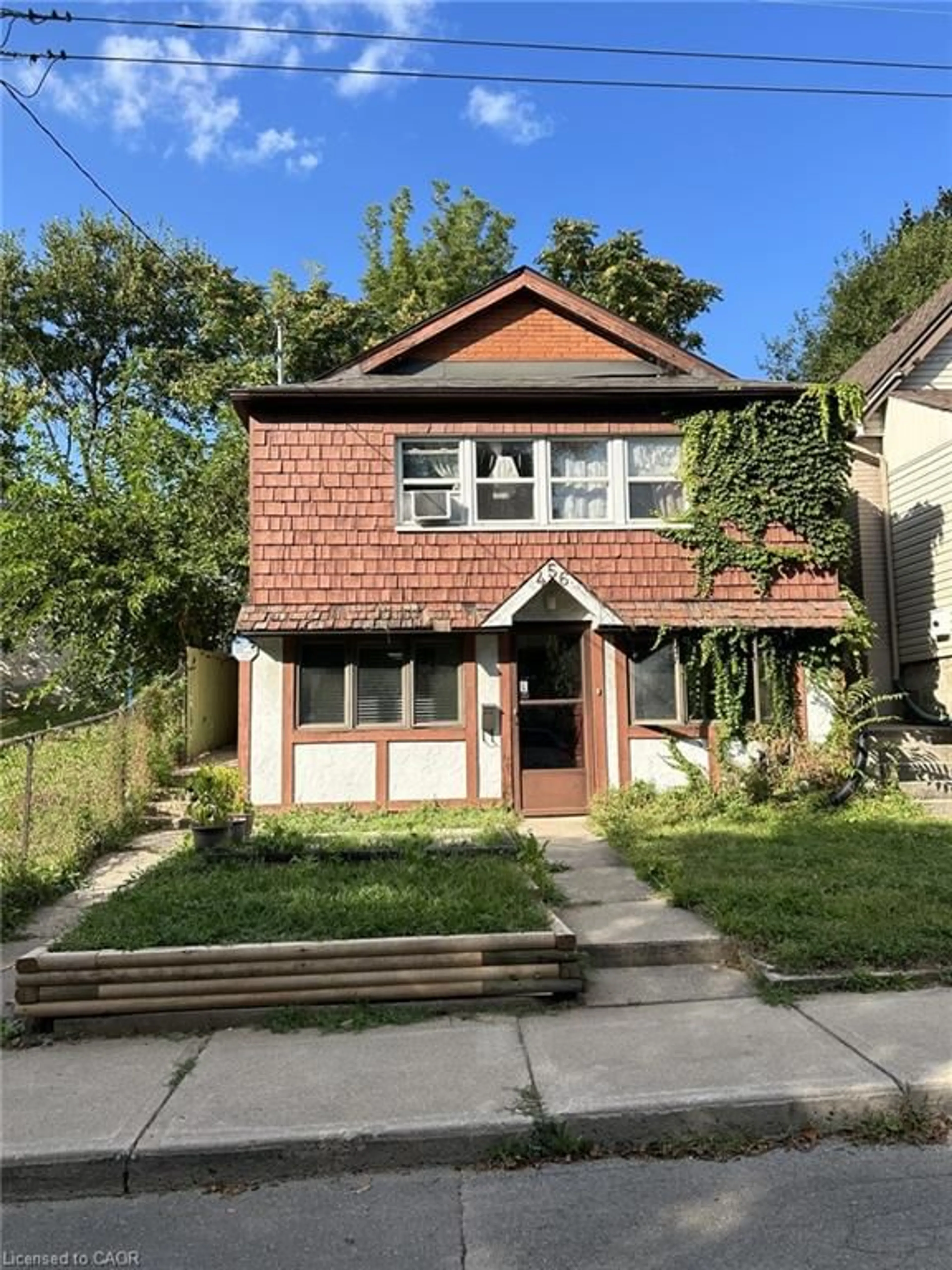 Home with brick exterior material, street for 456 Jackson St, Hamilton Ontario L8P 1N4