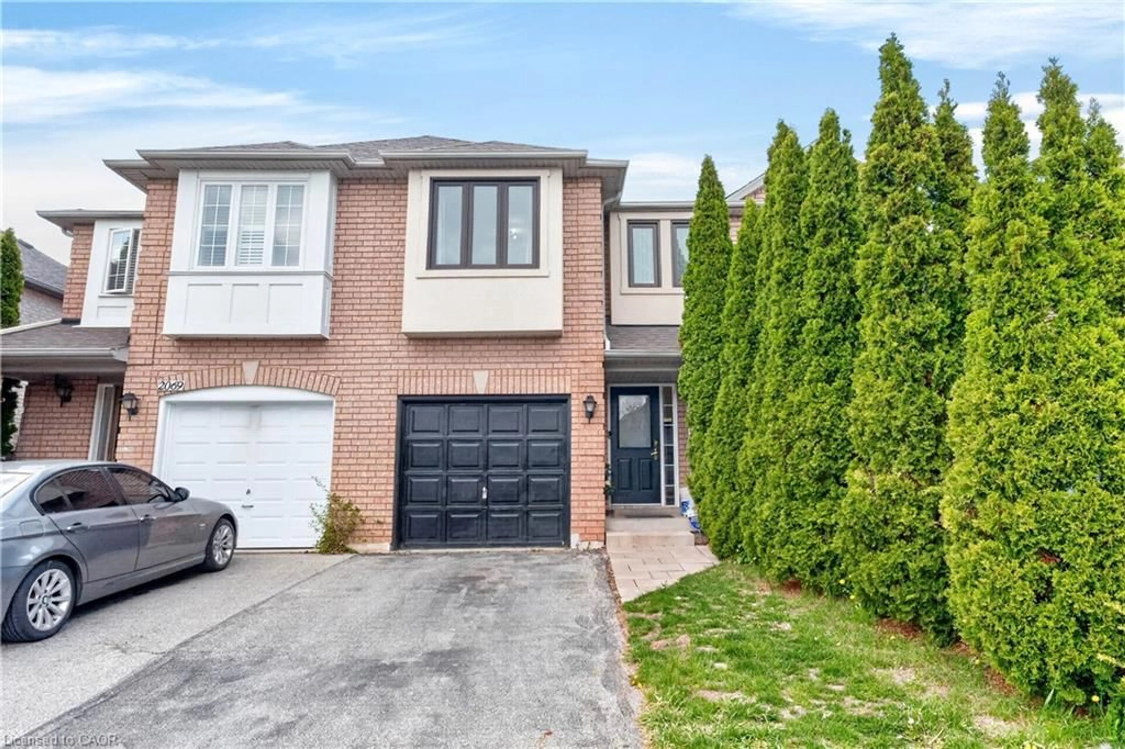 Home with brick exterior material, street for 2067 Golden Orchard Trail, Oakville Ontario L6M 3N5