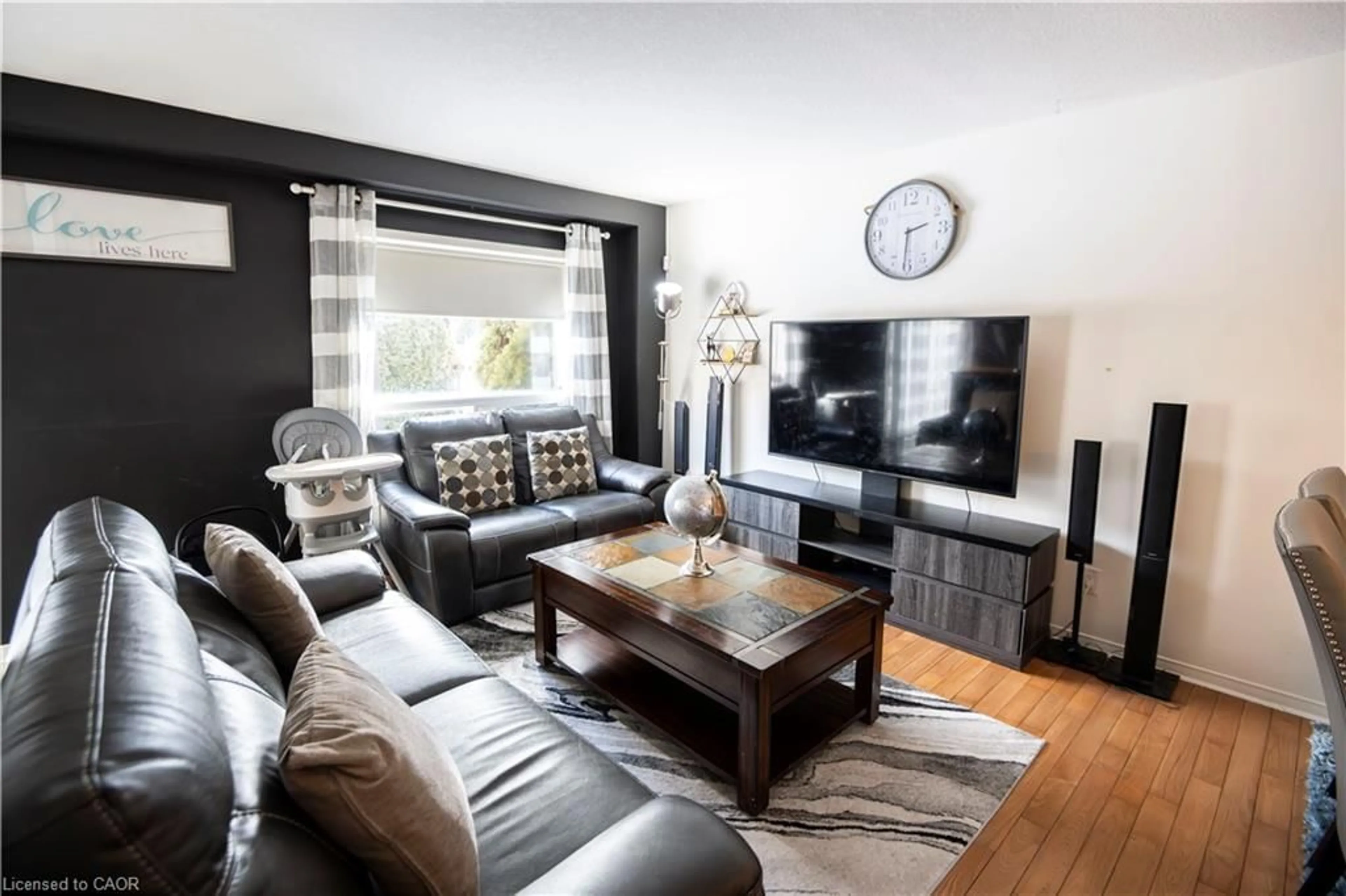 Living room with furniture, wood/laminate floor for 147 Dubrick Cres #1, Kitchener Ontario N2E 4G3