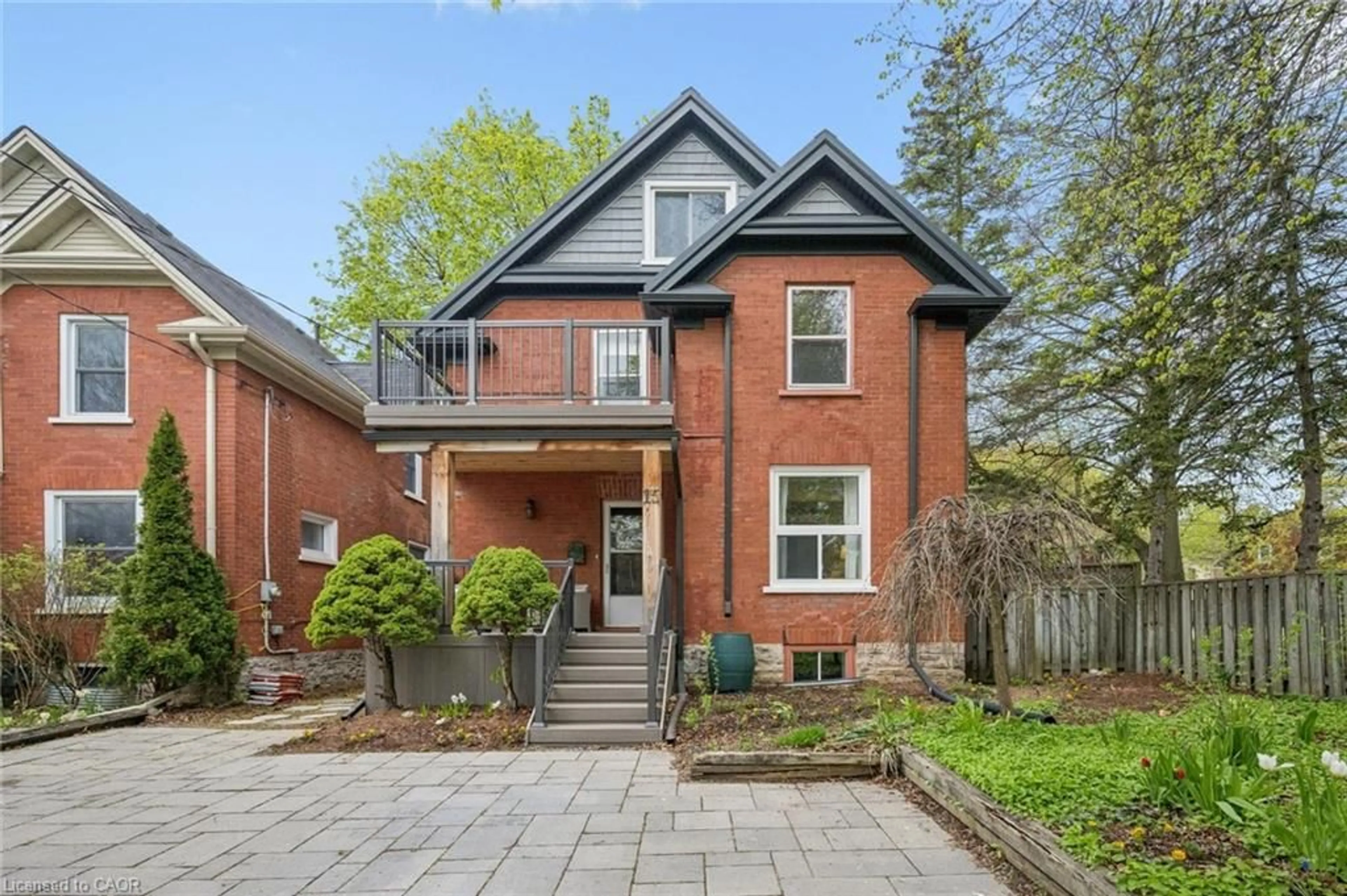 Home with brick exterior material, street for 15 Gordon Ave, Kitchener Ontario N2H 1N7