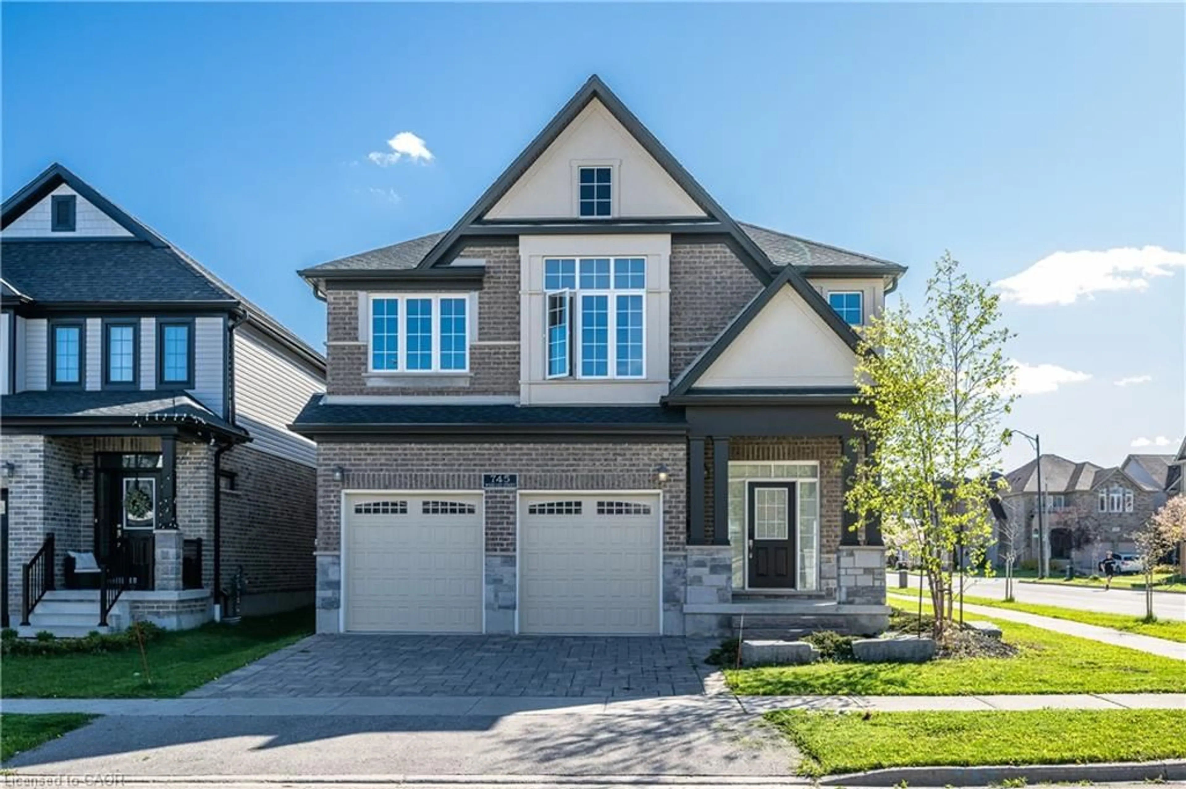 Home with brick exterior material, street for 745 Wood Lily St, Waterloo Ontario N2V 0C3