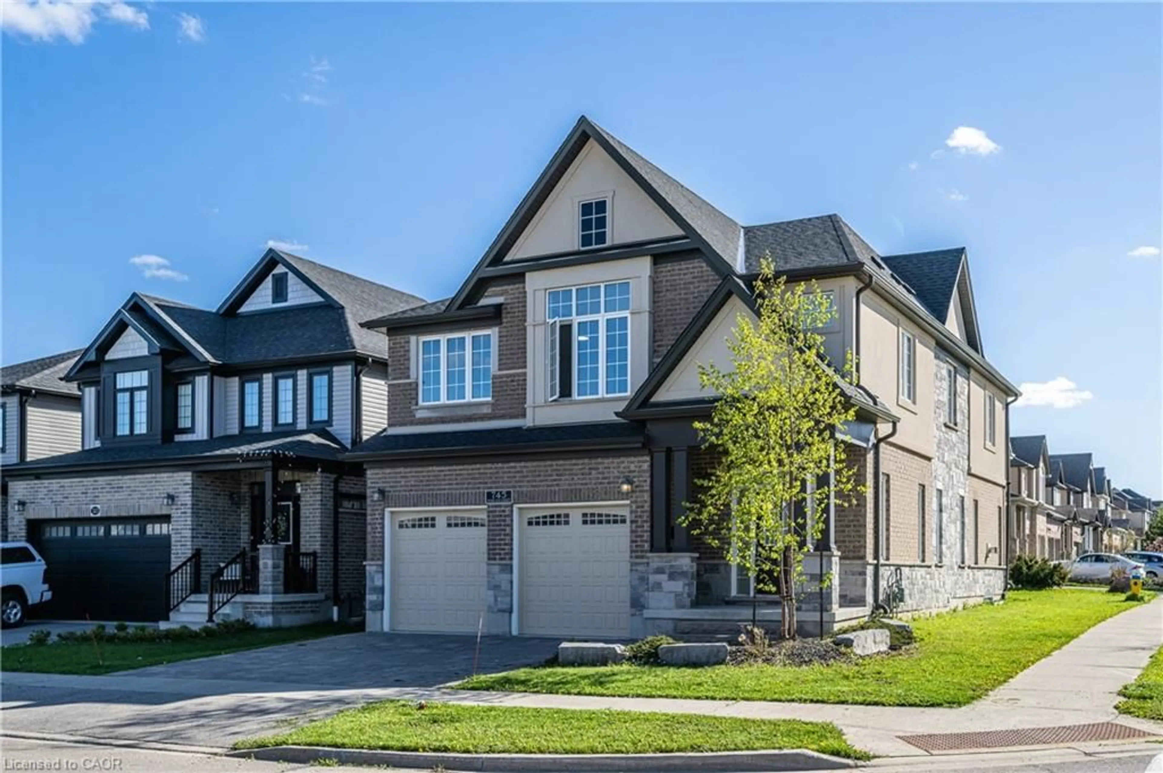 Home with brick exterior material, street for 745 Wood Lily St, Waterloo Ontario N2V 0C3
