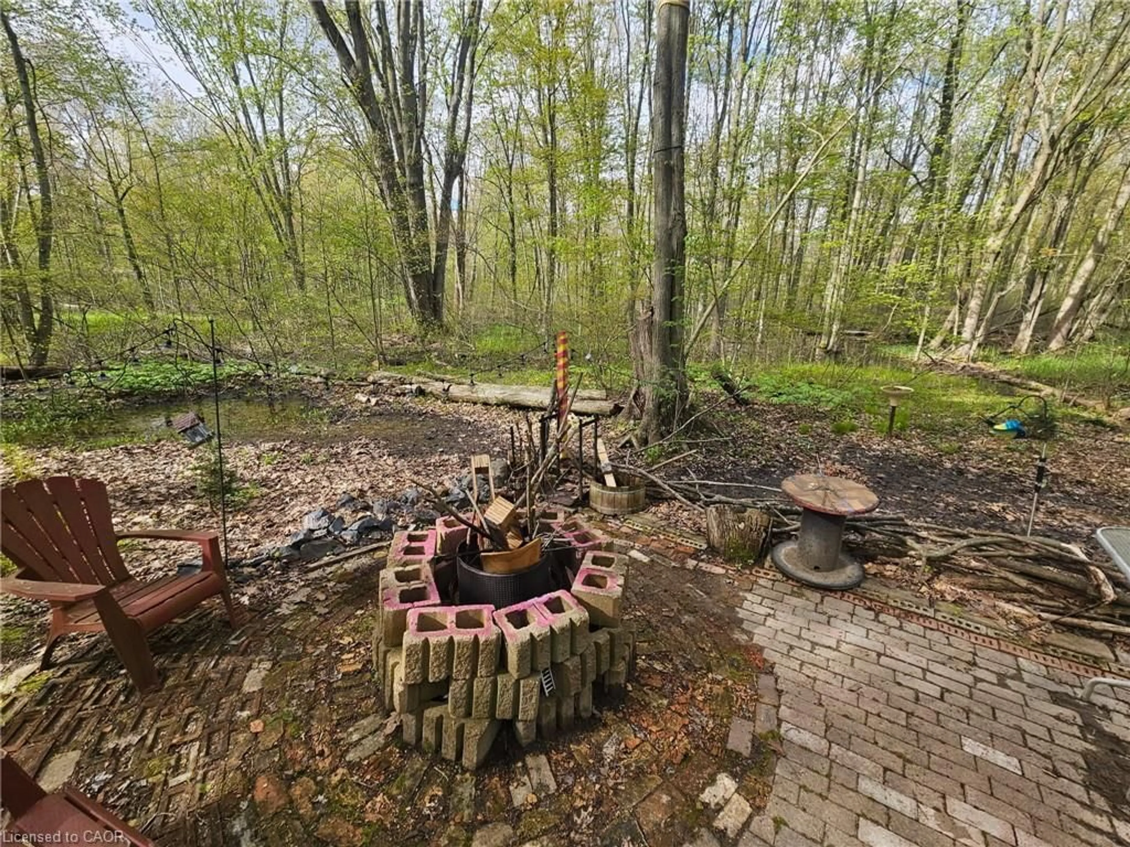A pic from outside/outdoor area/front of a property/back of a property/a pic from drone, forest/trees view for 334 Rattlesnake Rd #45, Dunnville Ontario N0A 1K0