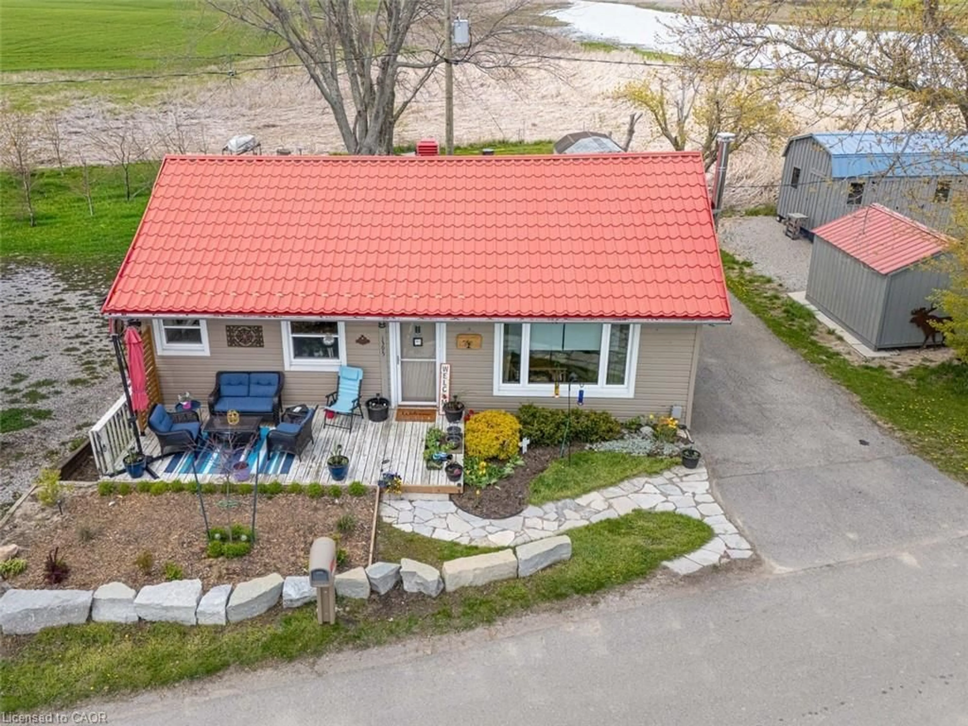 A pic from outside/outdoor area/front of a property/back of a property/a pic from drone, street for 1395 Lakeshore Rd, Haldimand County Ontario N0A 1P0