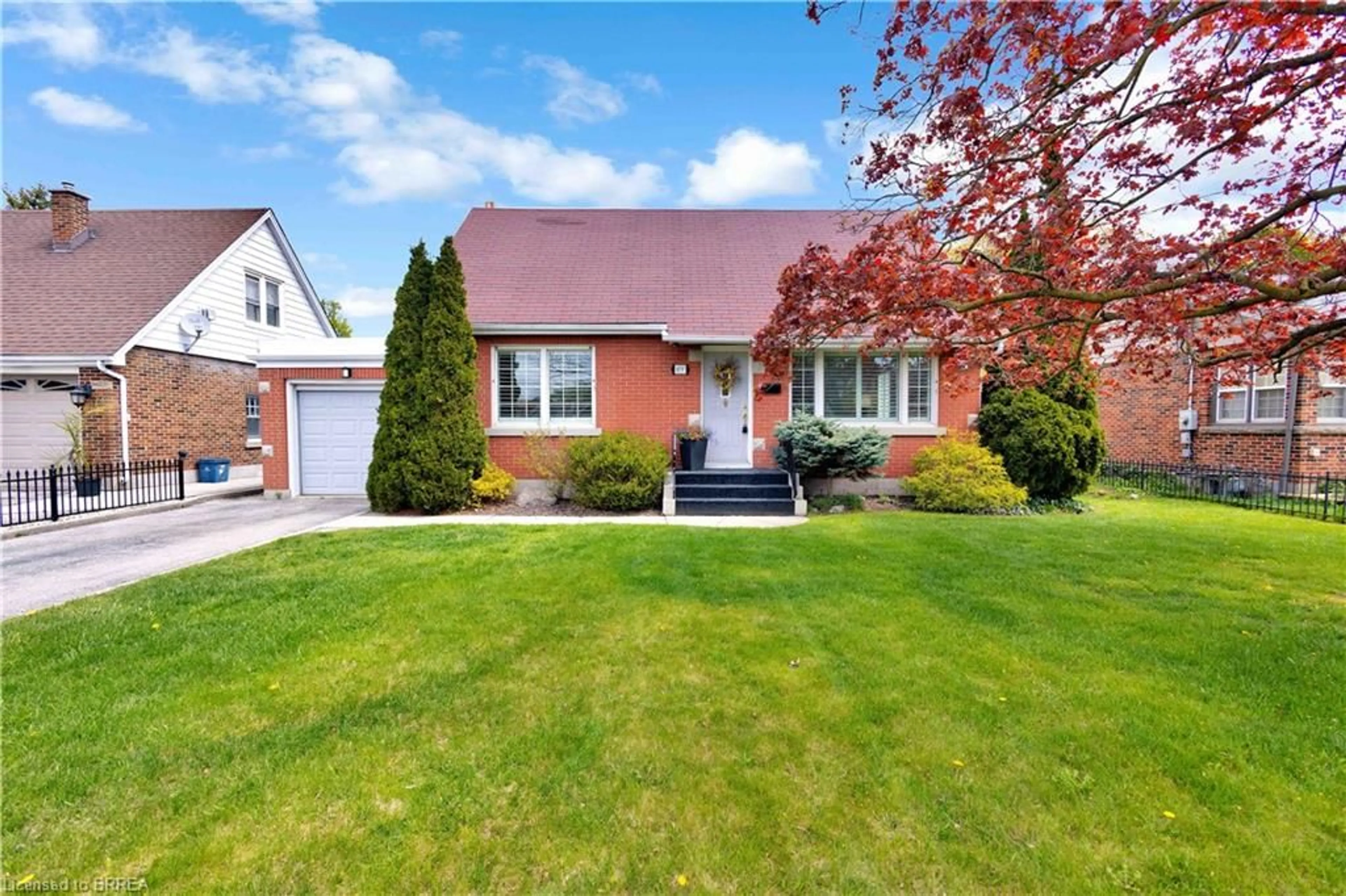 Home with brick exterior material, street for 177 St George St, Brantford Ontario N3R 1W1