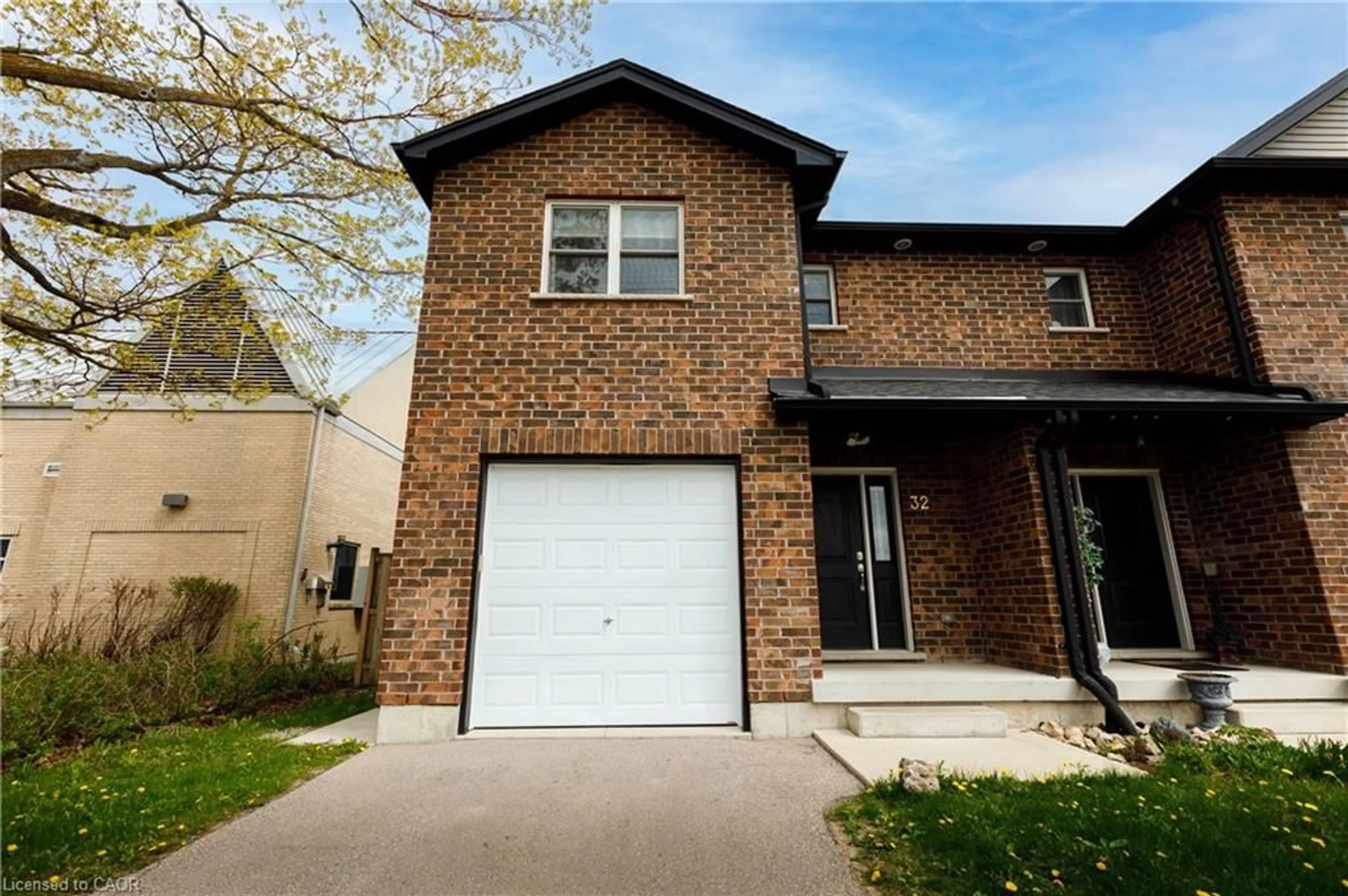Home with brick exterior material, street for 32 Frederick St, Stratford Ontario N5A 3V4