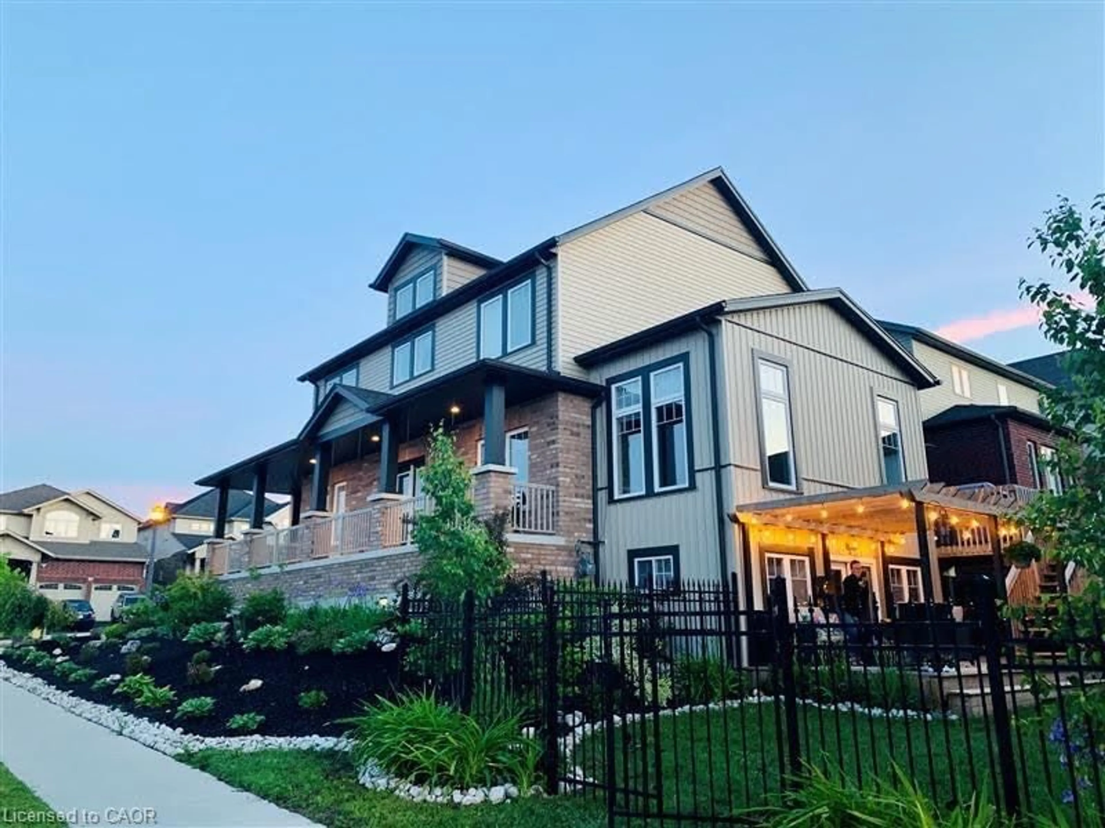 Home with brick exterior material, street for 387 Gravel Ridge Trail, Kitchener Ontario N2E 0B9