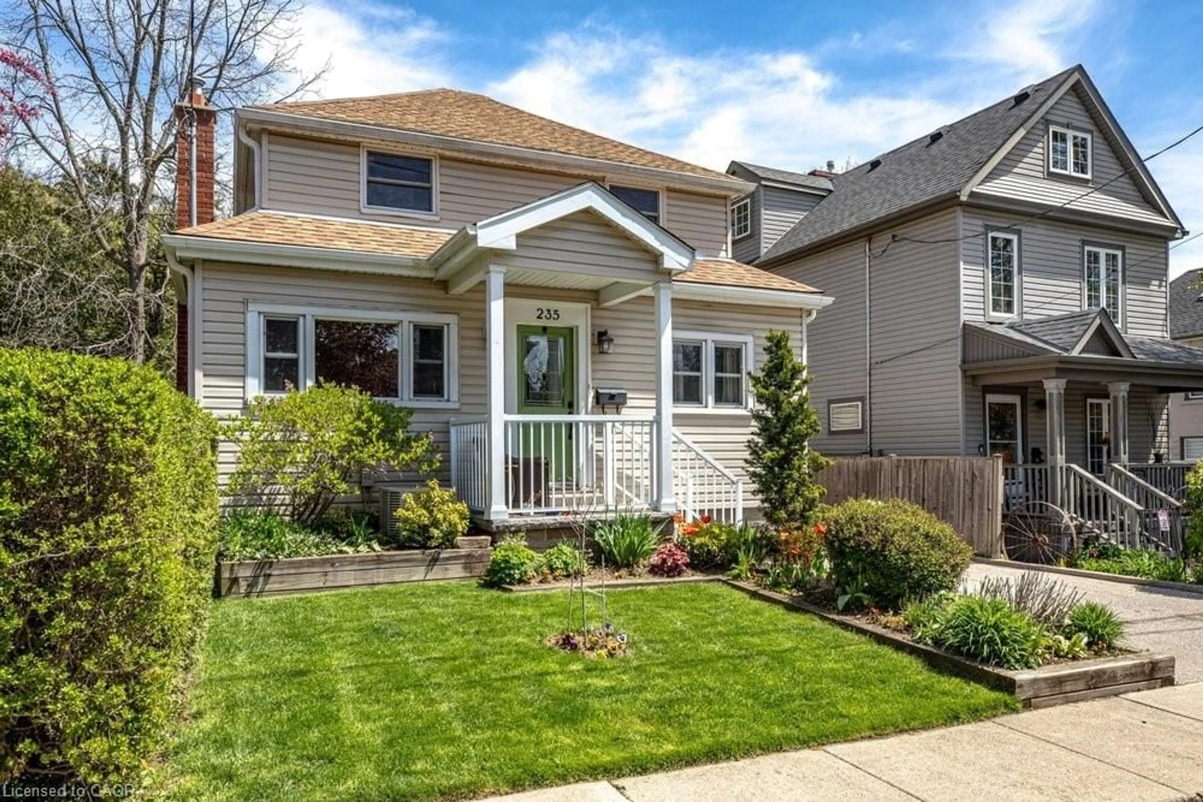 Home with vinyl exterior material, street for 235 Melville St, Dundas Ontario L9H 2B3
