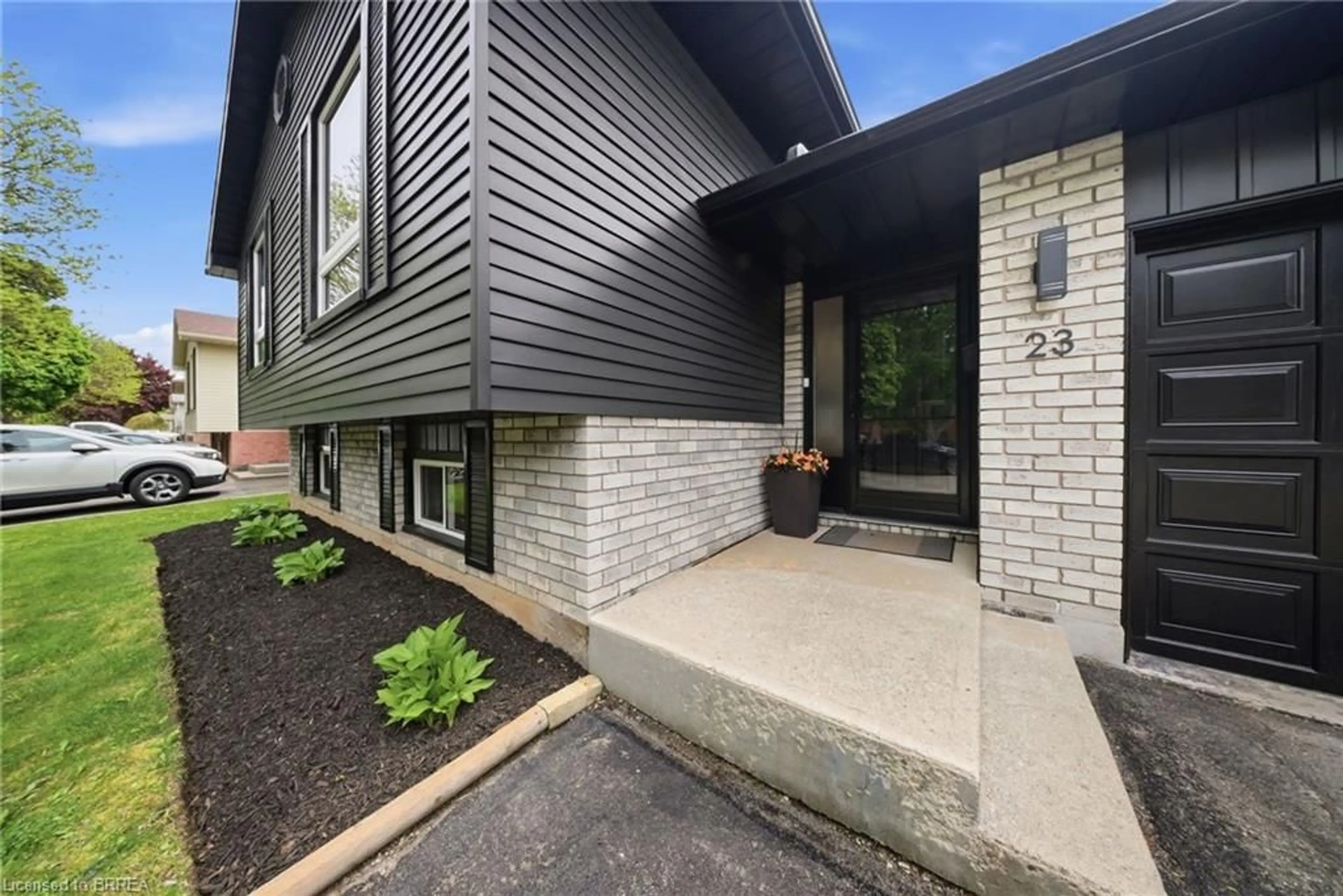 Home with brick exterior material, street for 23 Myrtleville Dr, Brantford Ontario N3V 1B8