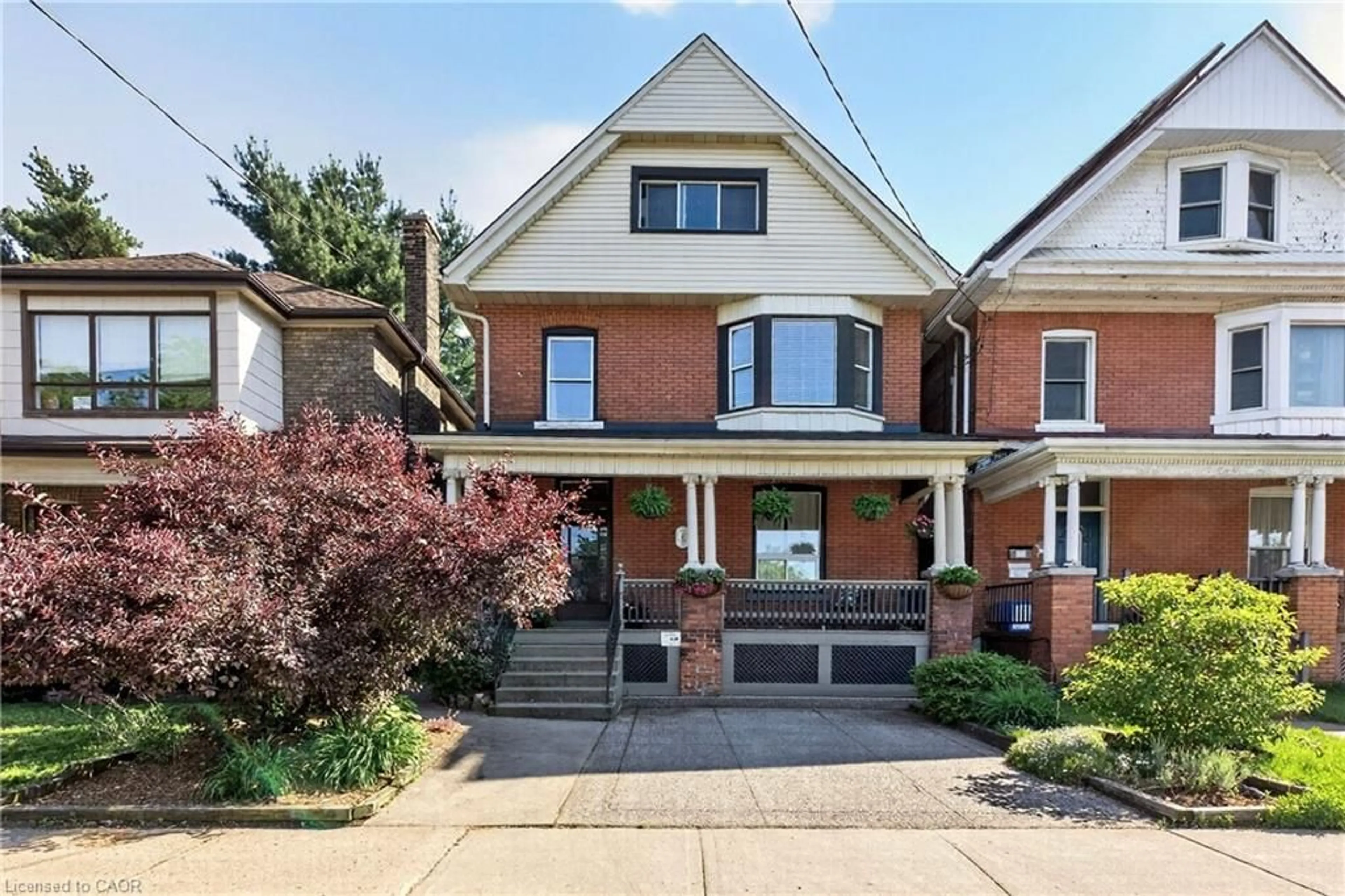 Home with brick exterior material, street for 68 Delaware Ave, Hamilton Ontario L8M 1T7