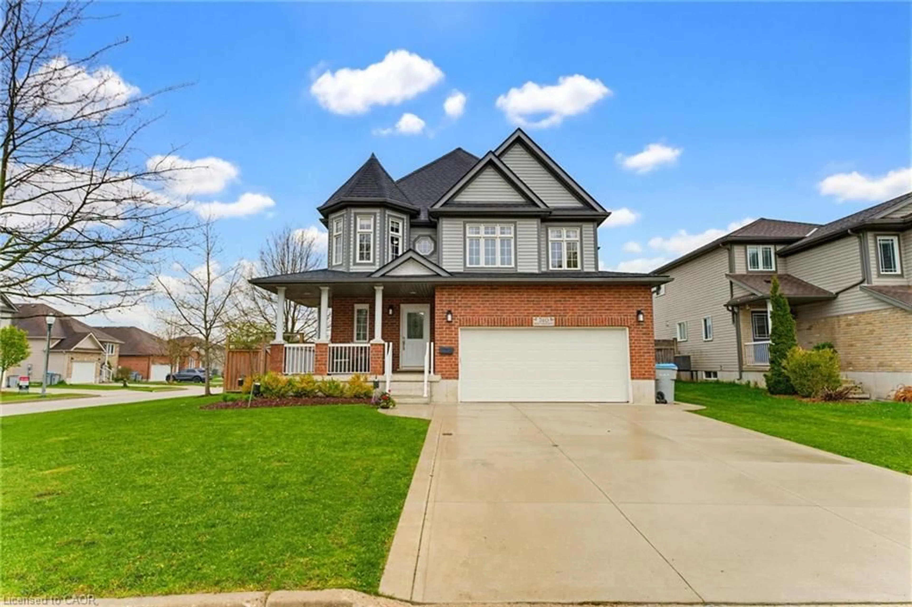 Home with brick exterior material, street for 740 Reid Cres, Listowel Ontario N4W 0A2
