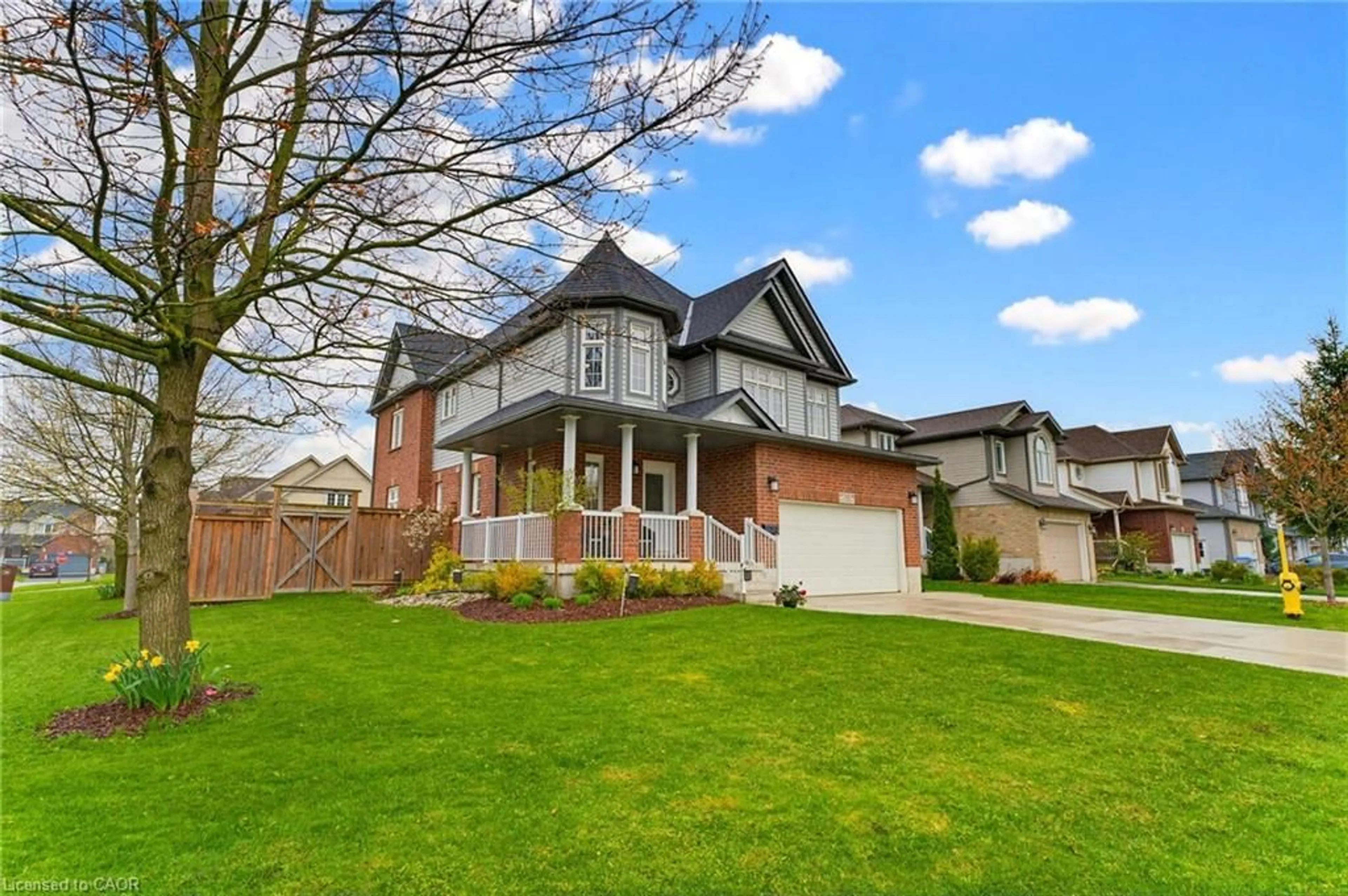 Home with brick exterior material, street for 740 Reid Cres, Listowel Ontario N4W 0A2