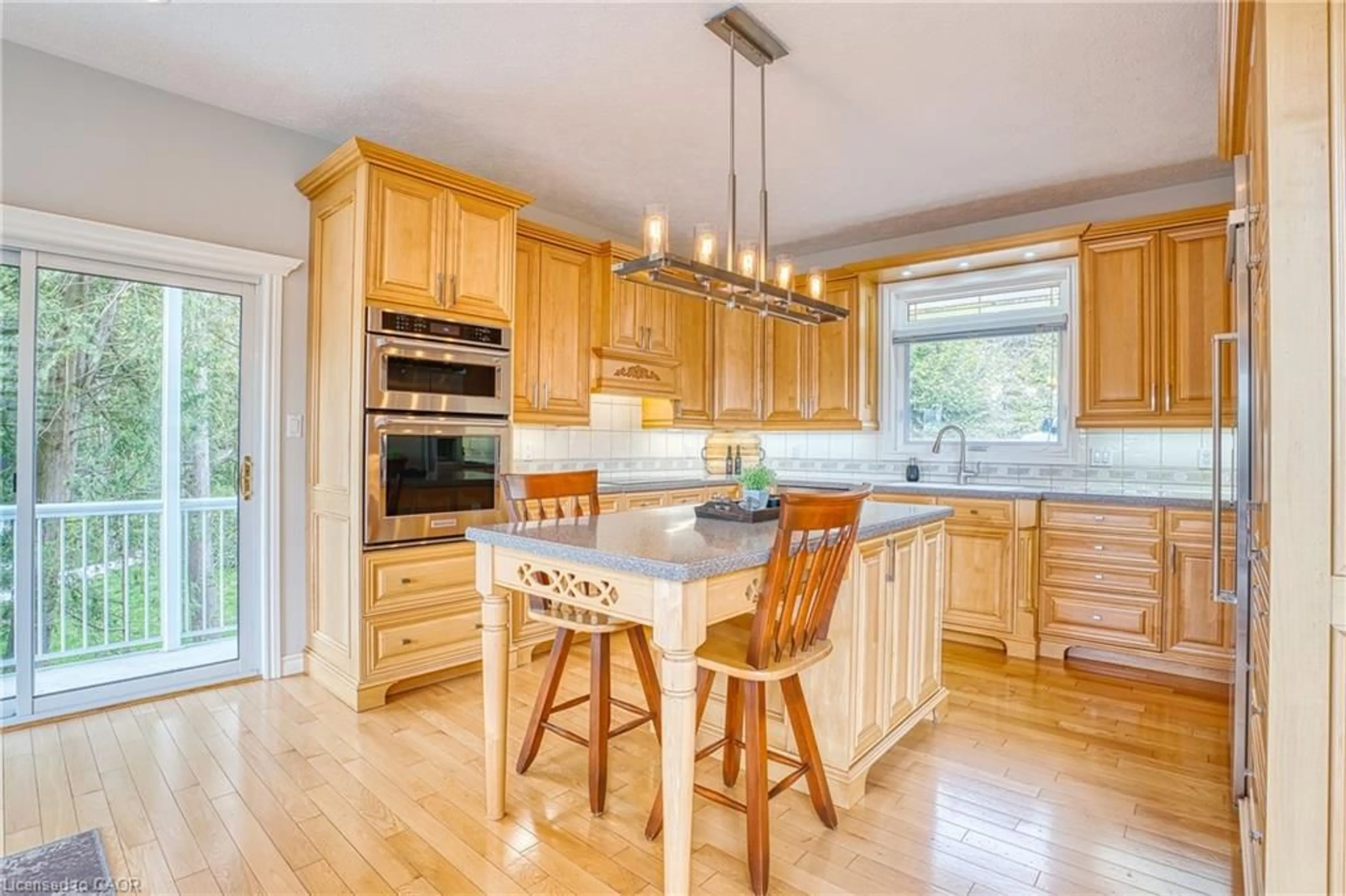 Open concept kitchen, wood/laminate floor for 461 Lake Rosalind Rd 4, Hanover Ontario N4N 3B9