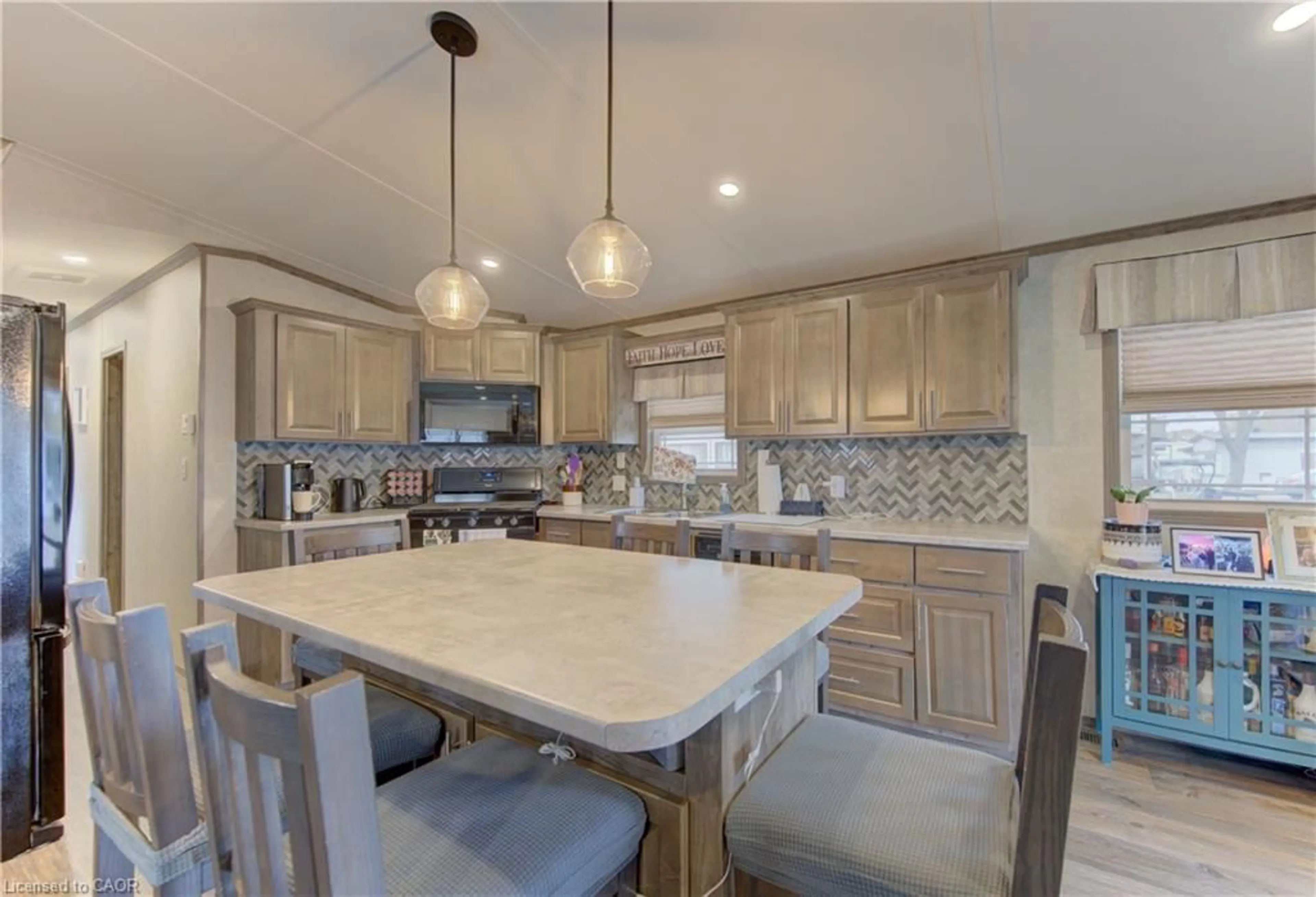 Open concept kitchen, ceramic/tile floor for 580 Beaver Creek Rd #235, Waterloo Ontario N2J 3Z4