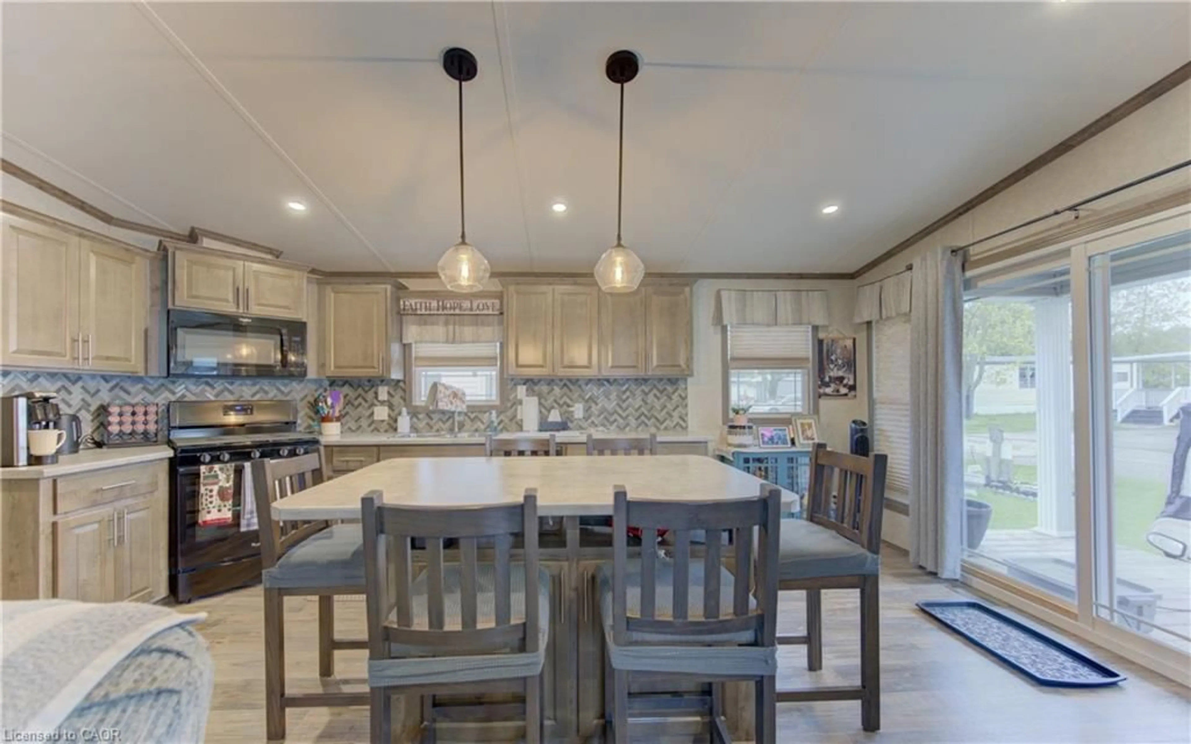 Open concept kitchen, ceramic/tile floor for 580 Beaver Creek Rd #235, Waterloo Ontario N2J 3Z4