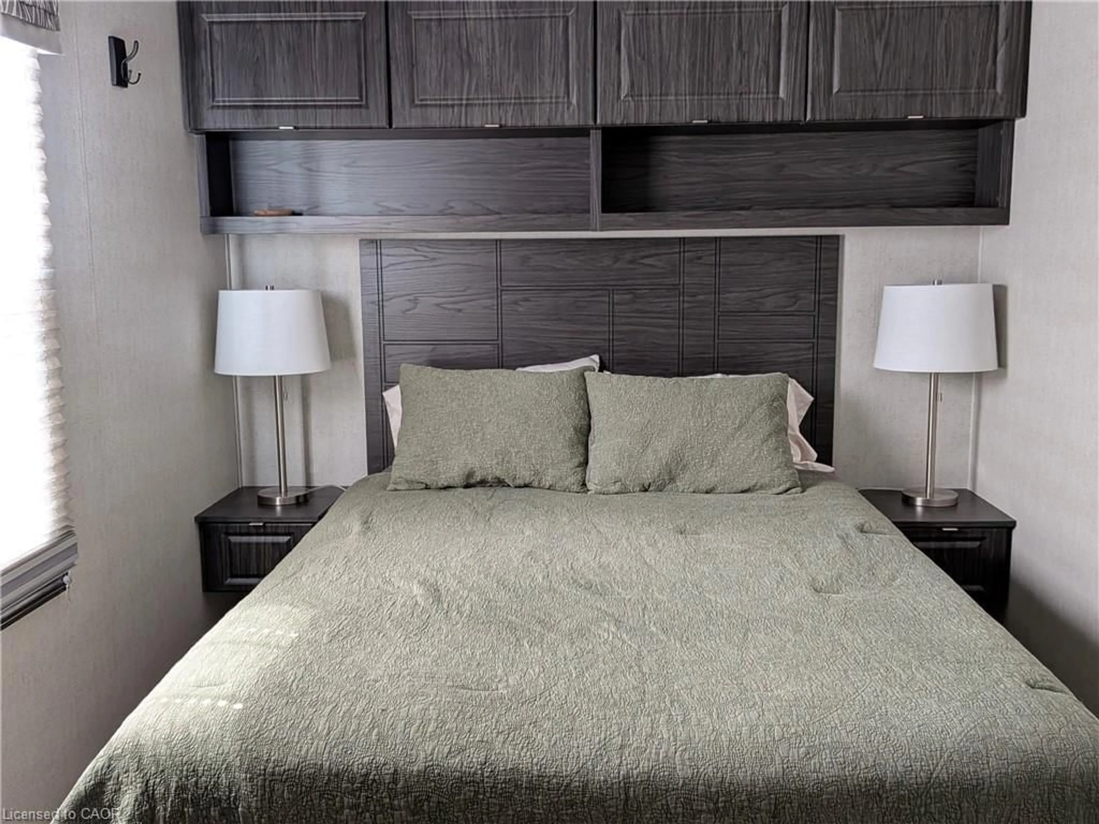 Bedroom with bed, wood/laminate floor for 1235 Villiers Line #CHYHILL054, Keene Ontario K0L 2G0