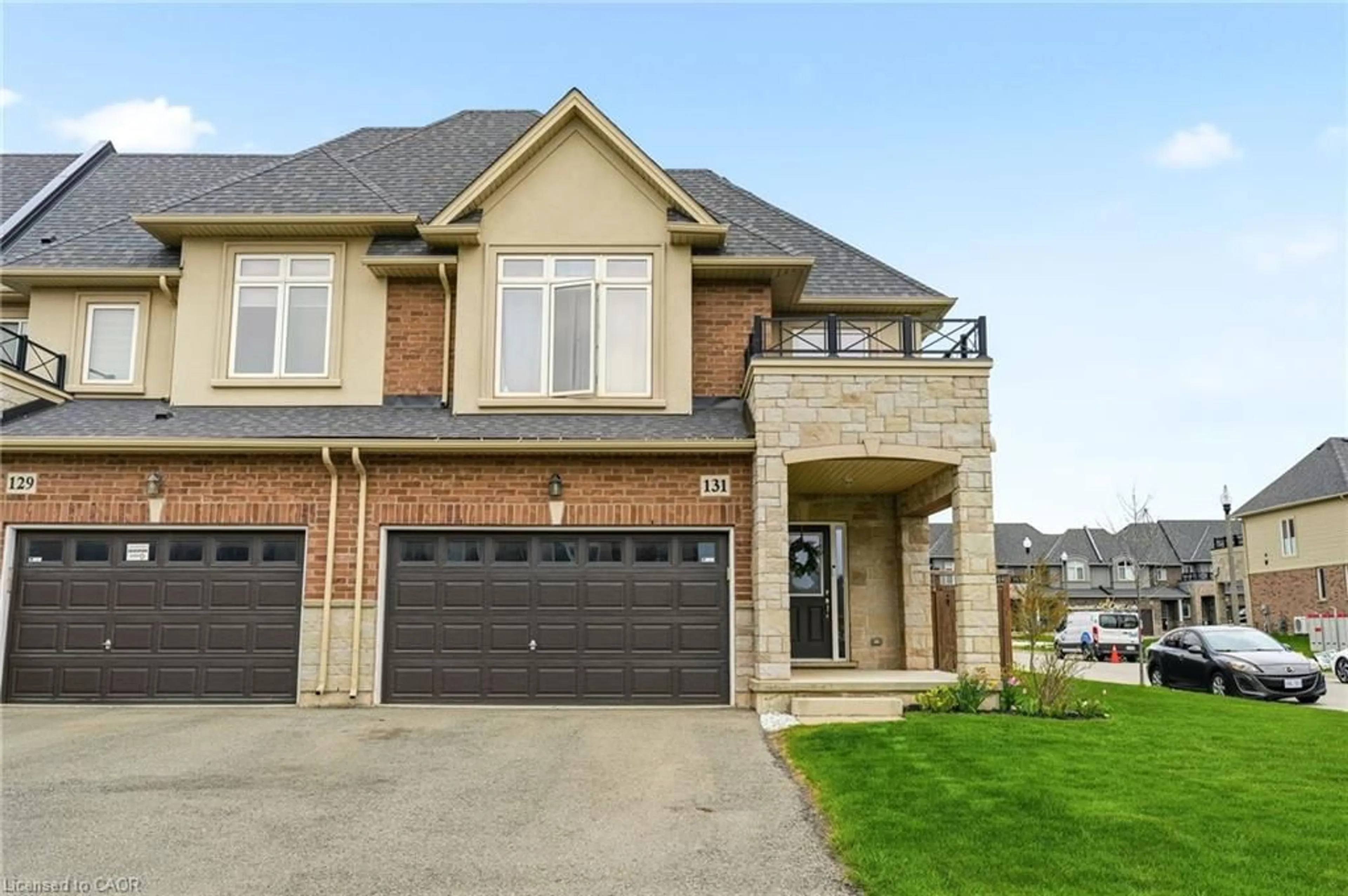 Home with brick exterior material, street for 131 Sonoma Lane, Stoney Creek Ontario L8E 0J9
