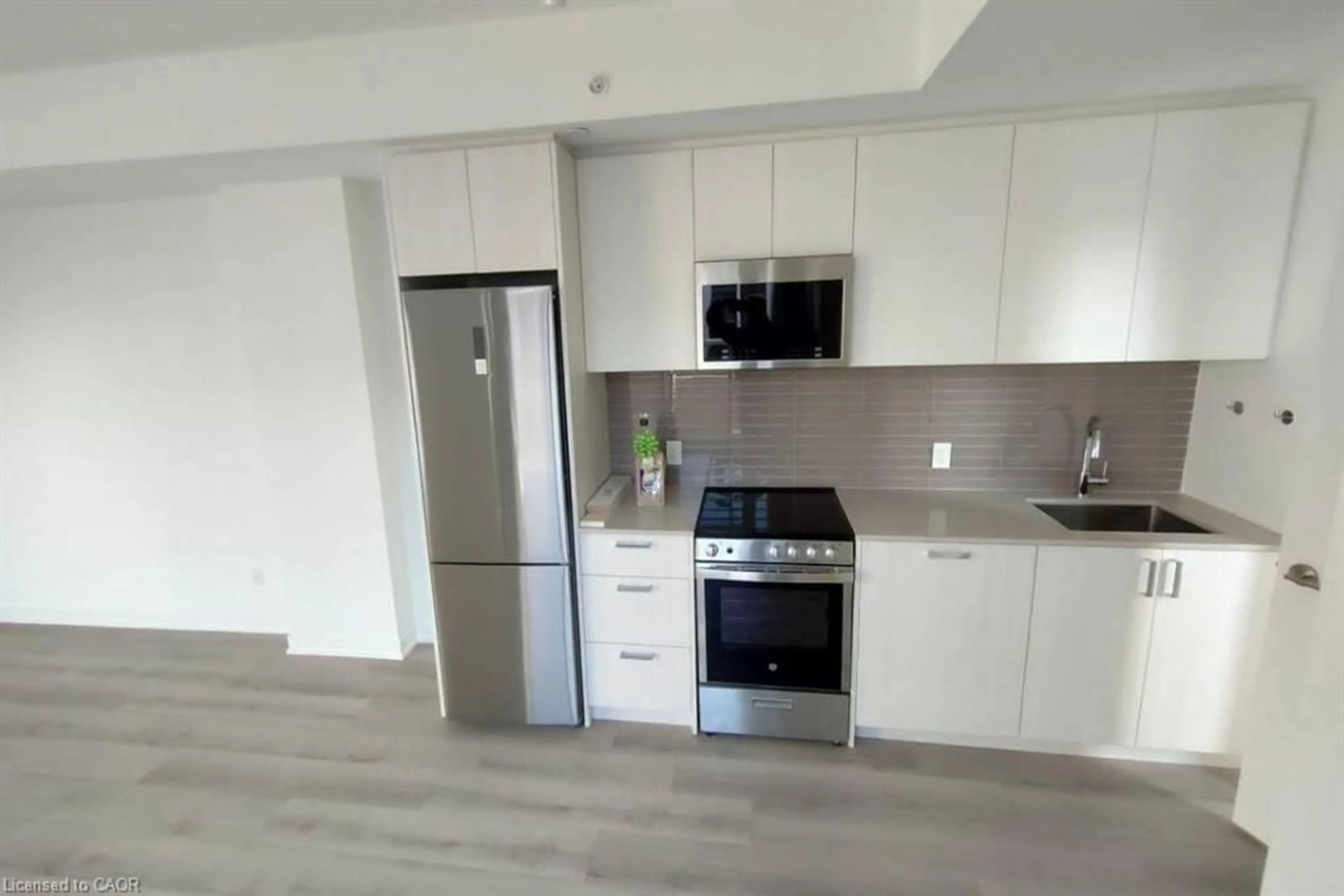 Open concept kitchen, unknown for 1787 St Clair Ave #1008, Toronto Ontario M6N 0B7