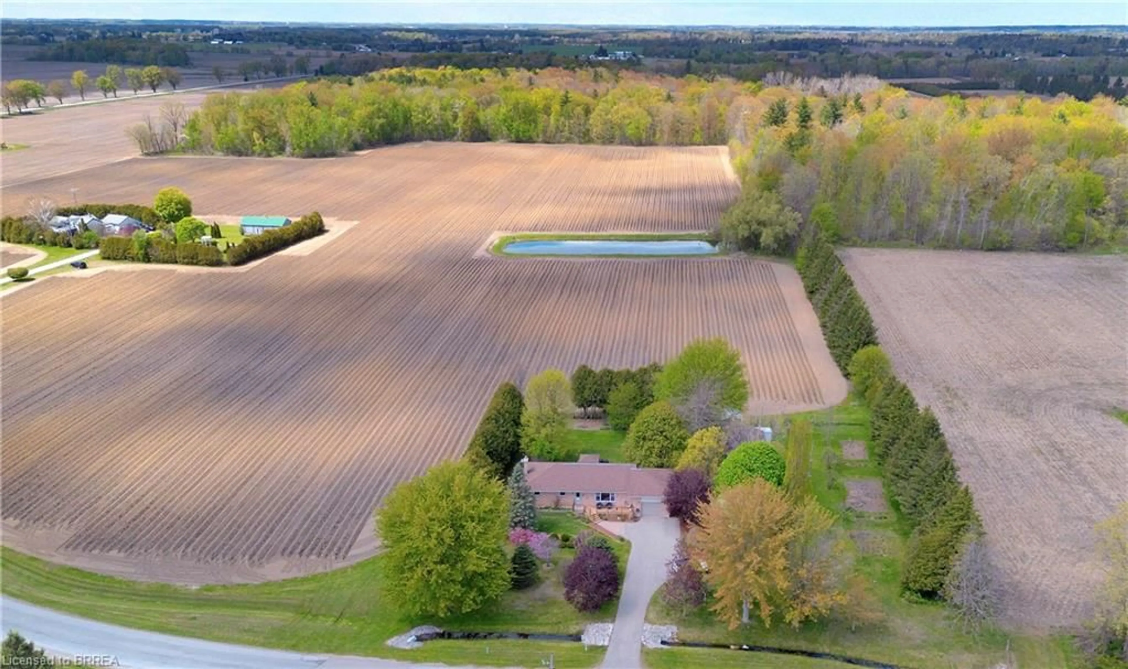 A pic from outside/outdoor area/front of a property/back of a property/a pic from drone, water/lake/river/ocean view for 2221 1st Conc Rd St, Delhi Ontario N4B 2W4