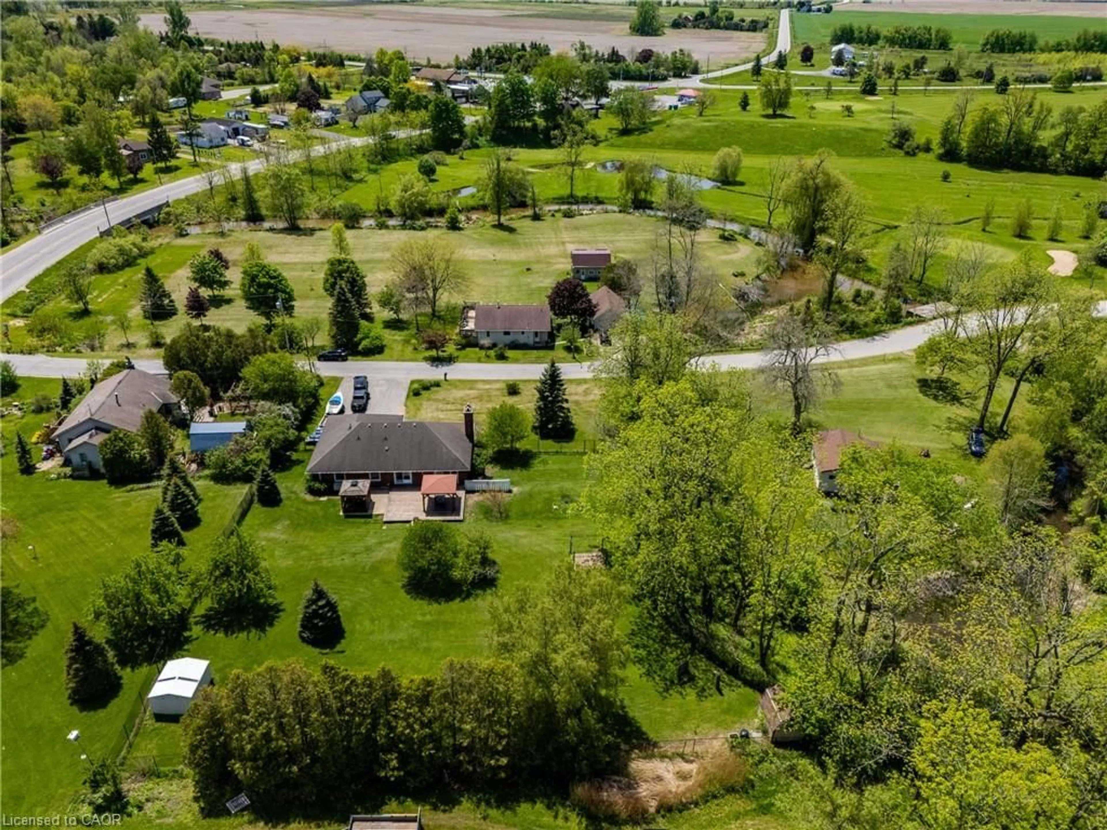 A pic from outside/outdoor area/front of a property/back of a property/a pic from drone, unknown for 6 Dedrick Rd, Port Rowan Ontario N0E 1M0