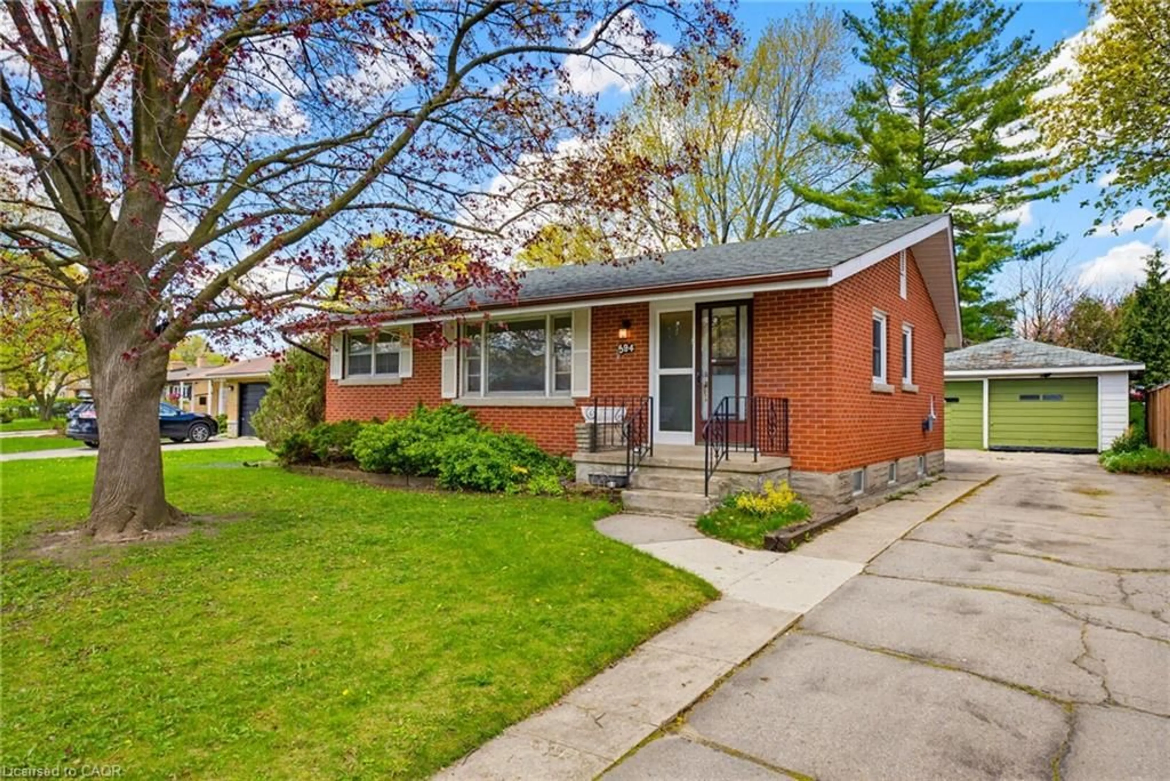 Home with brick exterior material, street for 594 Krug St, Kitchener Ontario N2B 1L7